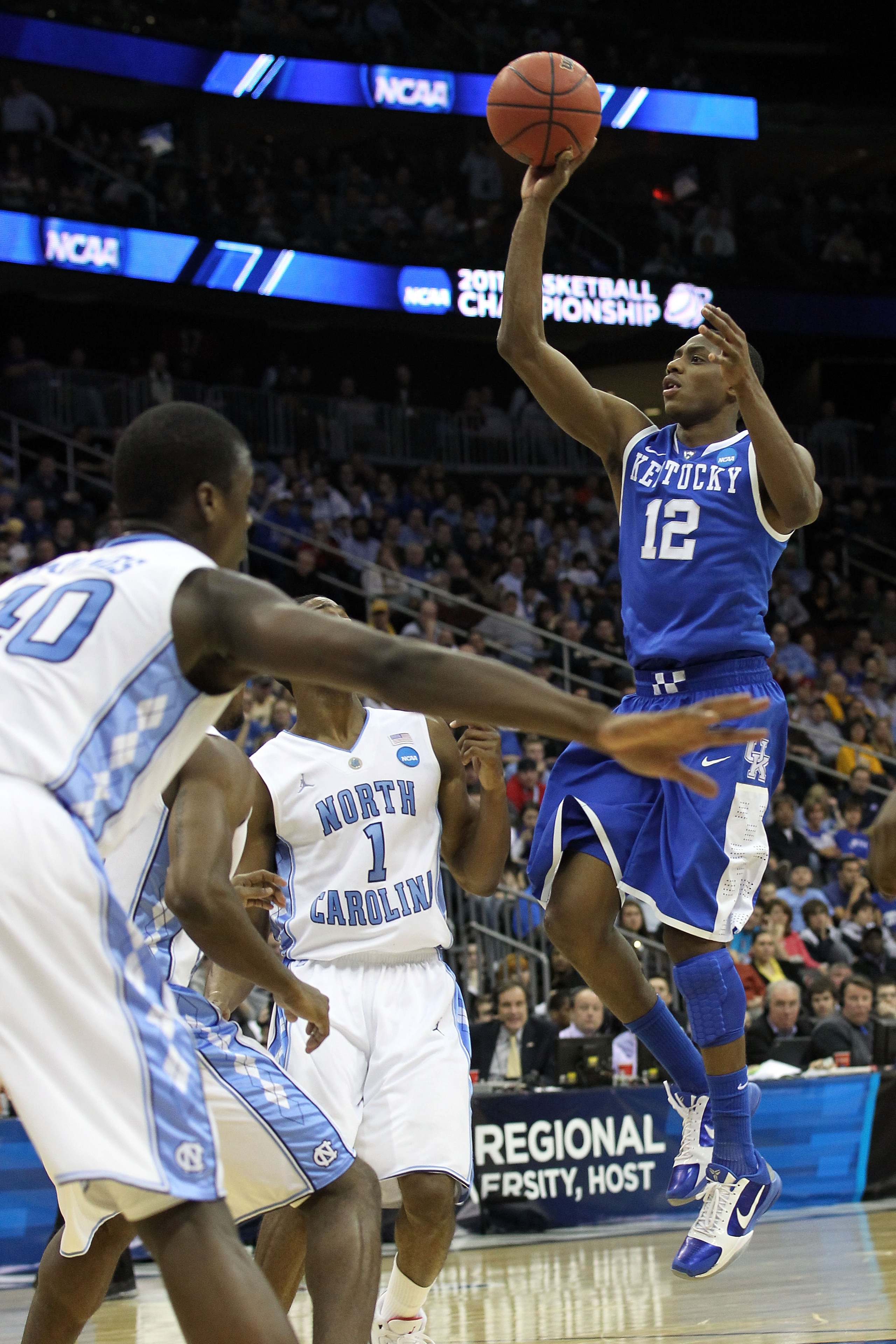 NEWARK, NJ - MARCH 27:  Brandon Knight #12 of the Kentucky Wildcats in action against Dexter Strickland #1 of the North Carolina Tar Heels during the east regional final of the 2011 NCAA men's basketball tournament at Prudential Center on March 27, 2011 i