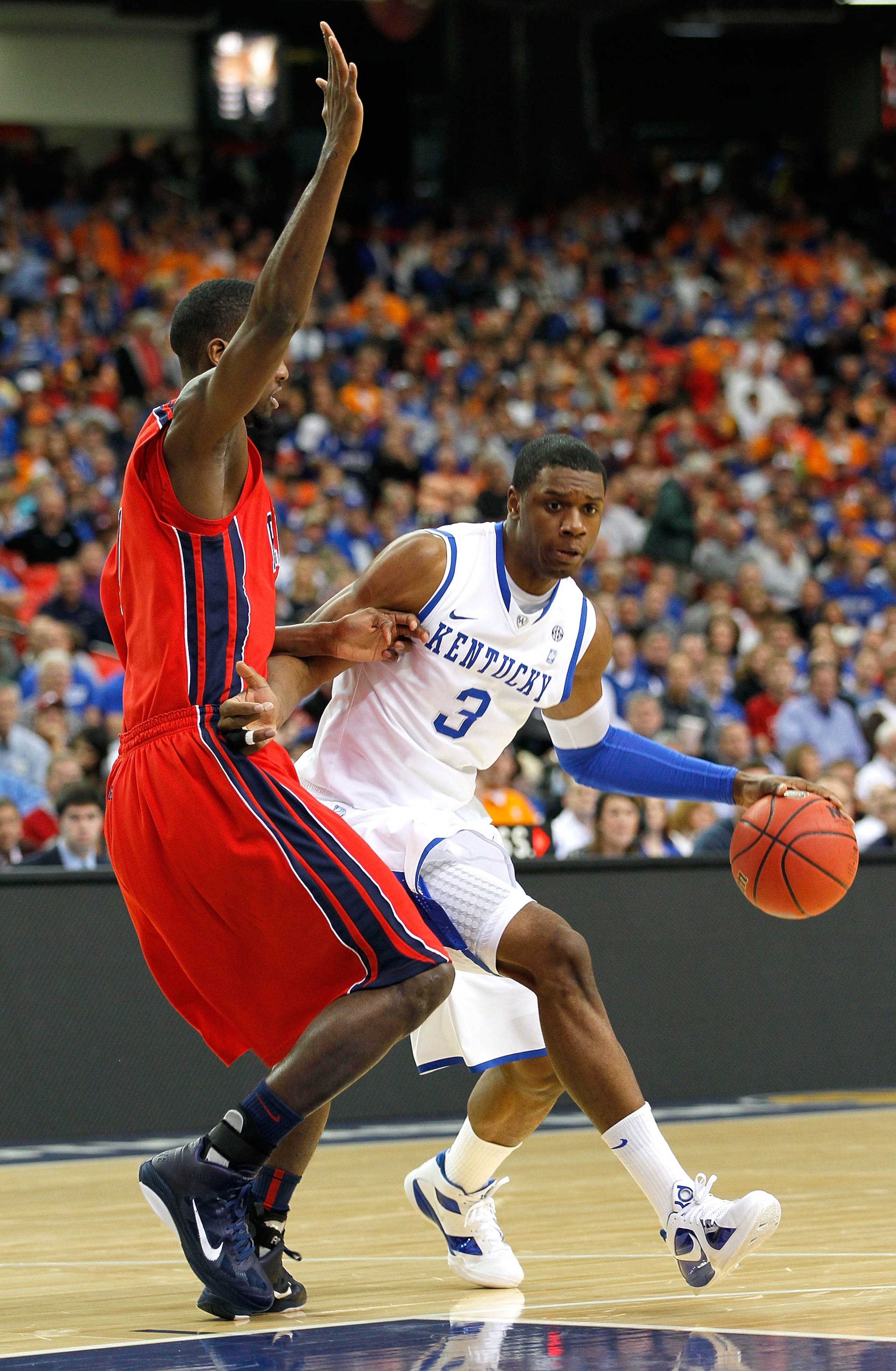 ATLANTA, GA - MARCH 11:  Terrence Jones #3 of the Kentucky Wildcats drives against Terrance Henry #1 of the Ole Miss Rebels during the quarterfinals of the SEC Men's Basketball Tournament at Georgia Dome on March 11, 2011 in Atlanta, Georgia.  (Photo by K