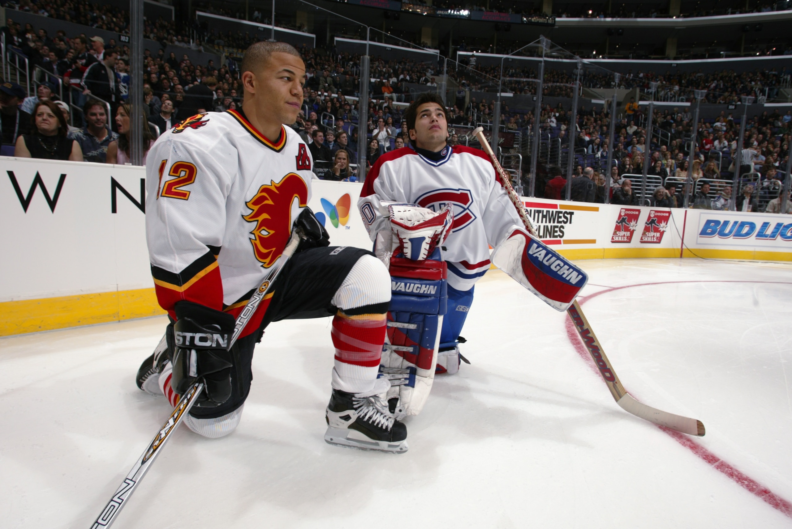 1 Feb 2002:   Jarome Iginla of the Calgary Flames and Jose Theodore of the Montreal Canadiens chat during the Dodge NHL SuperSkills competition at the Staples Center in Los Angeles, California.  The World defeated North America 21-11. DIGITAL IMAGE.  Mand