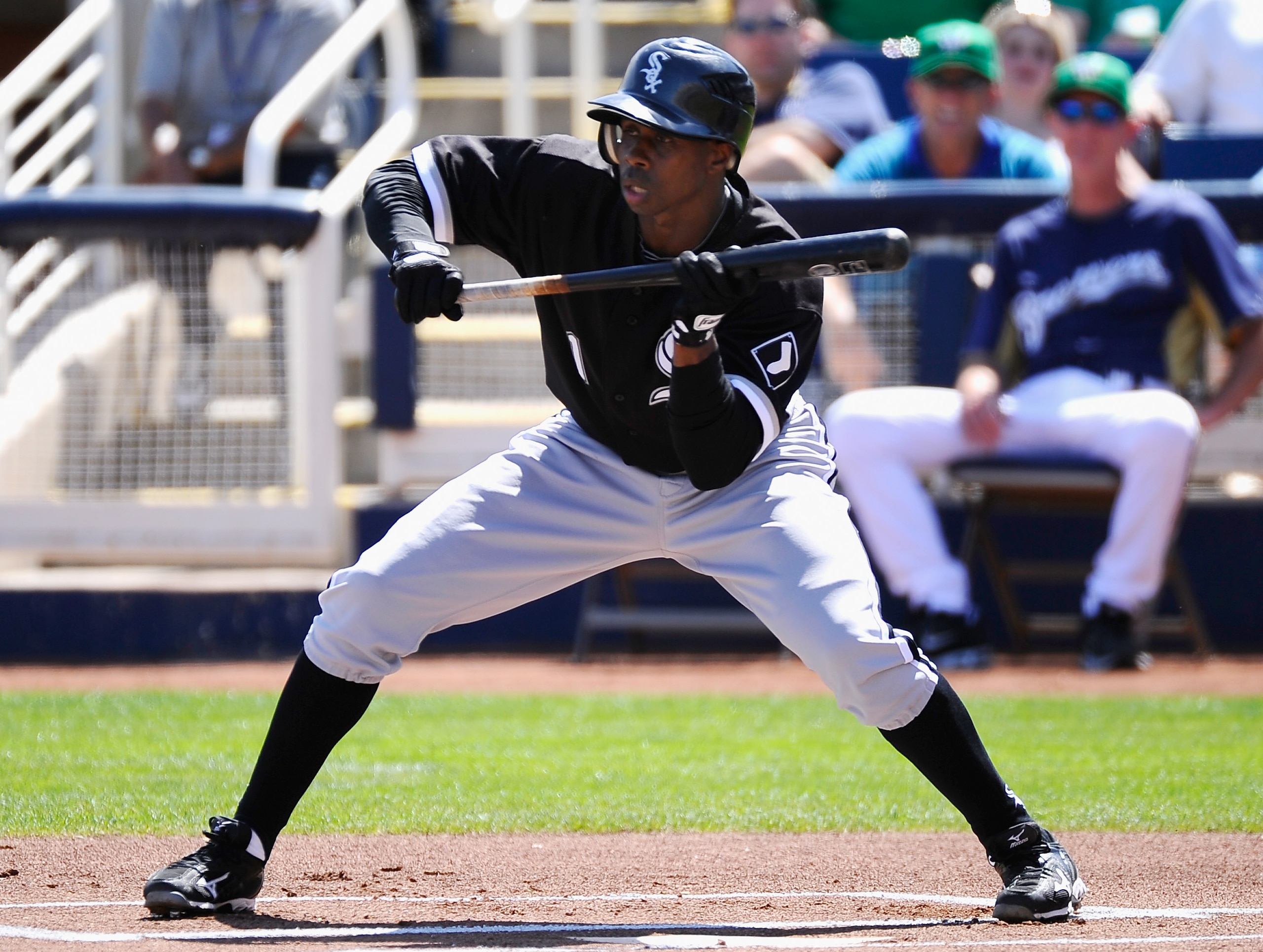 PHOENIX, AZ - MARCH 17: Juan Pierre #1 of the Chicago White Sox looks to bunt the ball against the Milwaukee Brewers during the first inning of the spring training game at Maryvale Baseball Park on March 17, 2011 in Phoenix, Arizona.  (Photo by Kevork Dja