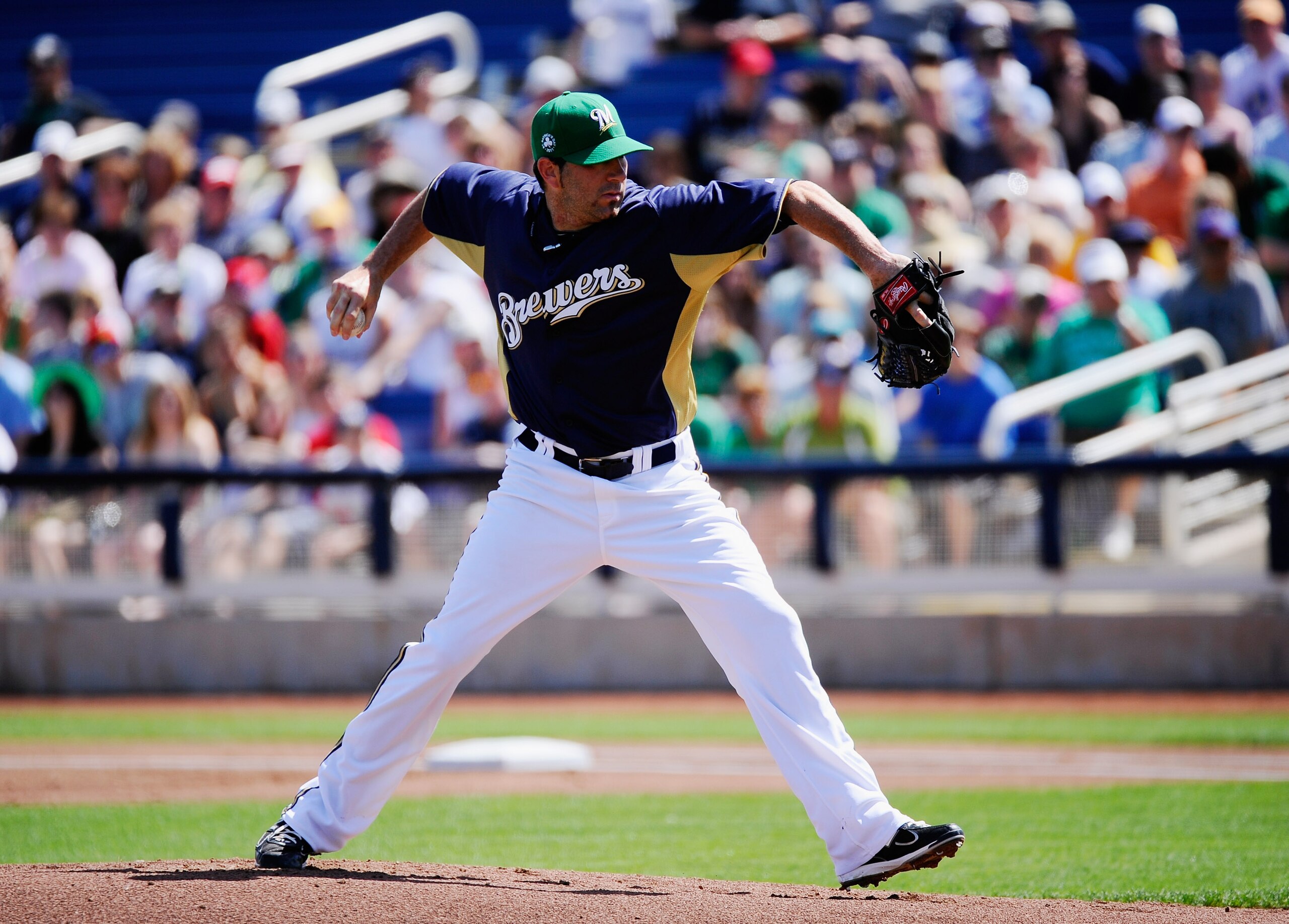 PHOENIX, AZ - MARCH 17:  Pitcher Shaun Marcum #18 of the Milwaukee Brewers throws a pitch against the Chicago White Sox during the first inning of the spring training game at Maryvale Baseball Park on March 17, 2011 in Phoenix, Arizona.  (Photo by Kevork