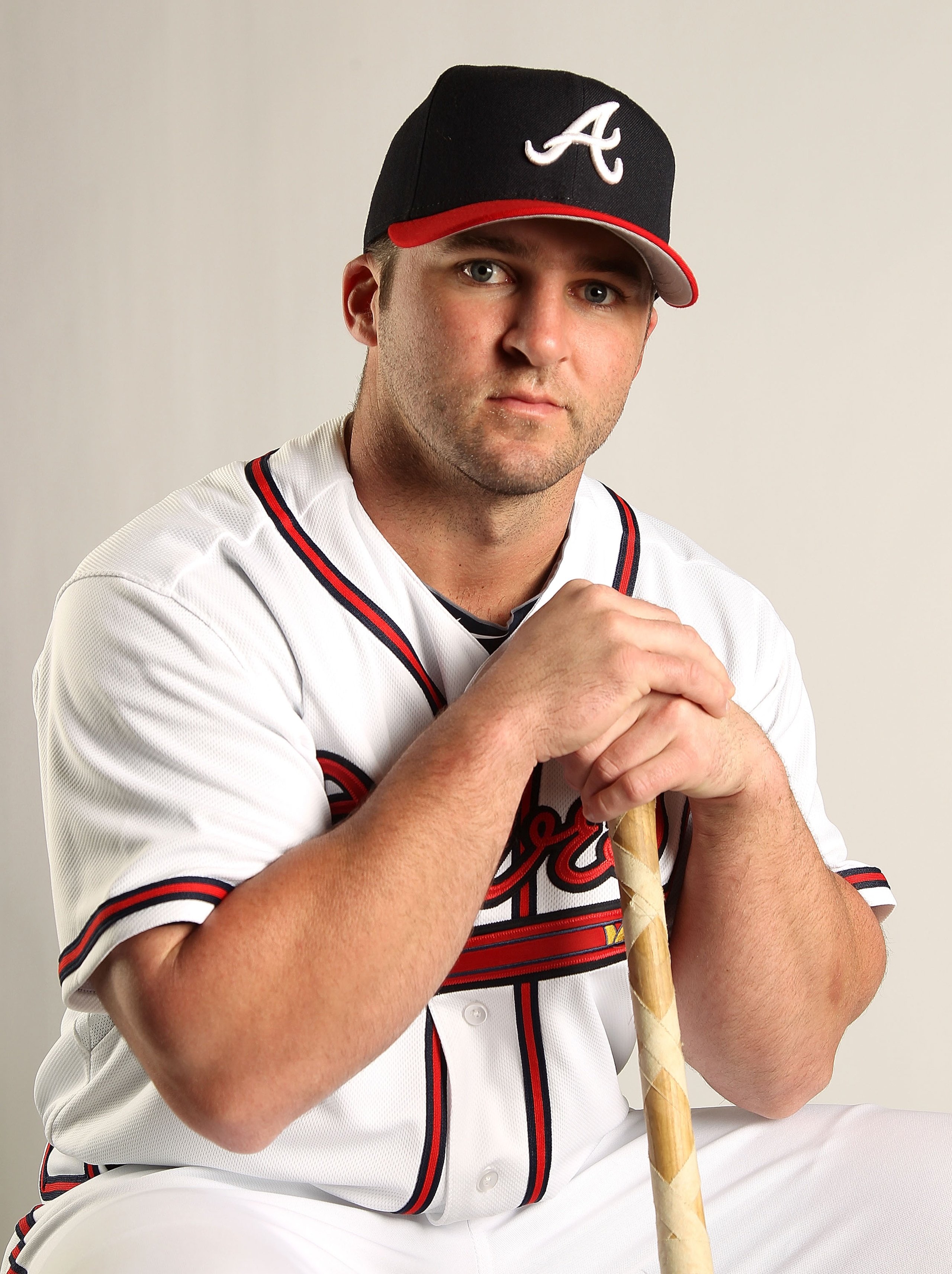 LAKE BUENA VISTA, FL - FEBRUARY 21: Dan Uggla #26 of the Atlanta Braves during Photo Day at  Champion Stadium at ESPN Wide World of Sports of Complex on February 21, 2011 in Lake Buena Vista, Florida.  (Photo by Mike Ehrmann/Getty Images)
