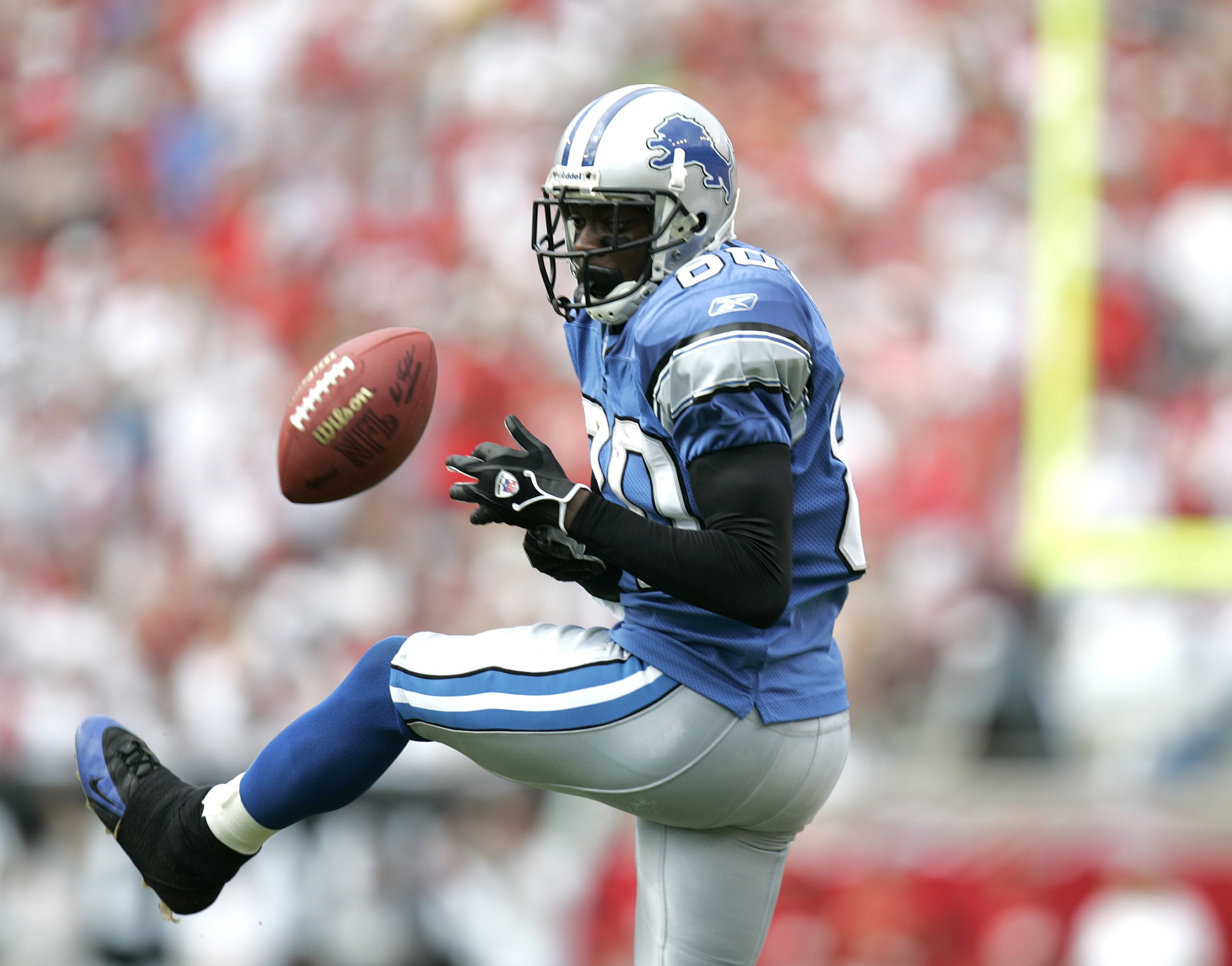 Detroit Lions wide receiver Charles Rogers (80) drops a pass during the fourth quarter against Tampa Bay at Raymond James Stadium in Tampa, Florida on October 2, 2005. Tampa Bay defeated Detroit 17-13. (Photo by Allen Kee/Getty Images)