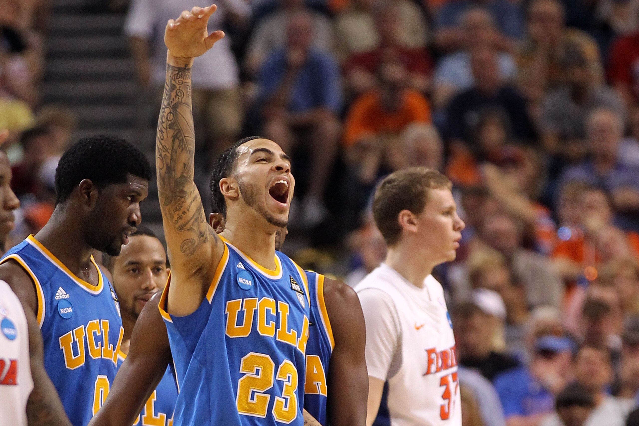 TAMPA, FL - MARCH 19:  Tyler Honeycutt #23 of the UCLA Bruins reacts against the Florida Gators during the third round of the 2011 NCAA men's basketball tournament at St. Pete Times Forum on March 19, 2011 in Tampa, Florida.  (Photo by Mike Ehrmann/Getty