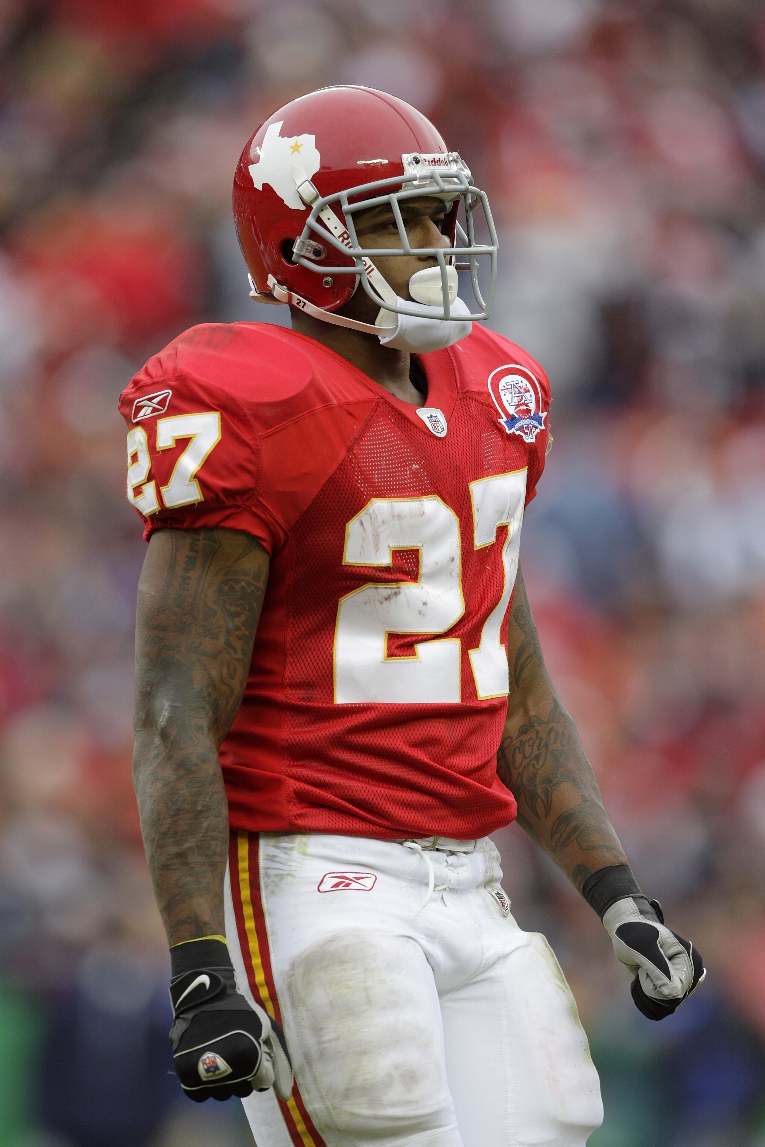 KANSAS CITY, MO - OCTOBER 11:  Larry Johnson #27 of the Kansas City Chiefs looks on during the NFL game against the Dallas Cowboys at Arrowhead Stadiumin on October 11, 2009 Kansas City, Missouri. The Cowboys defeated the Chiefs 26-20 in overtime. (Photo