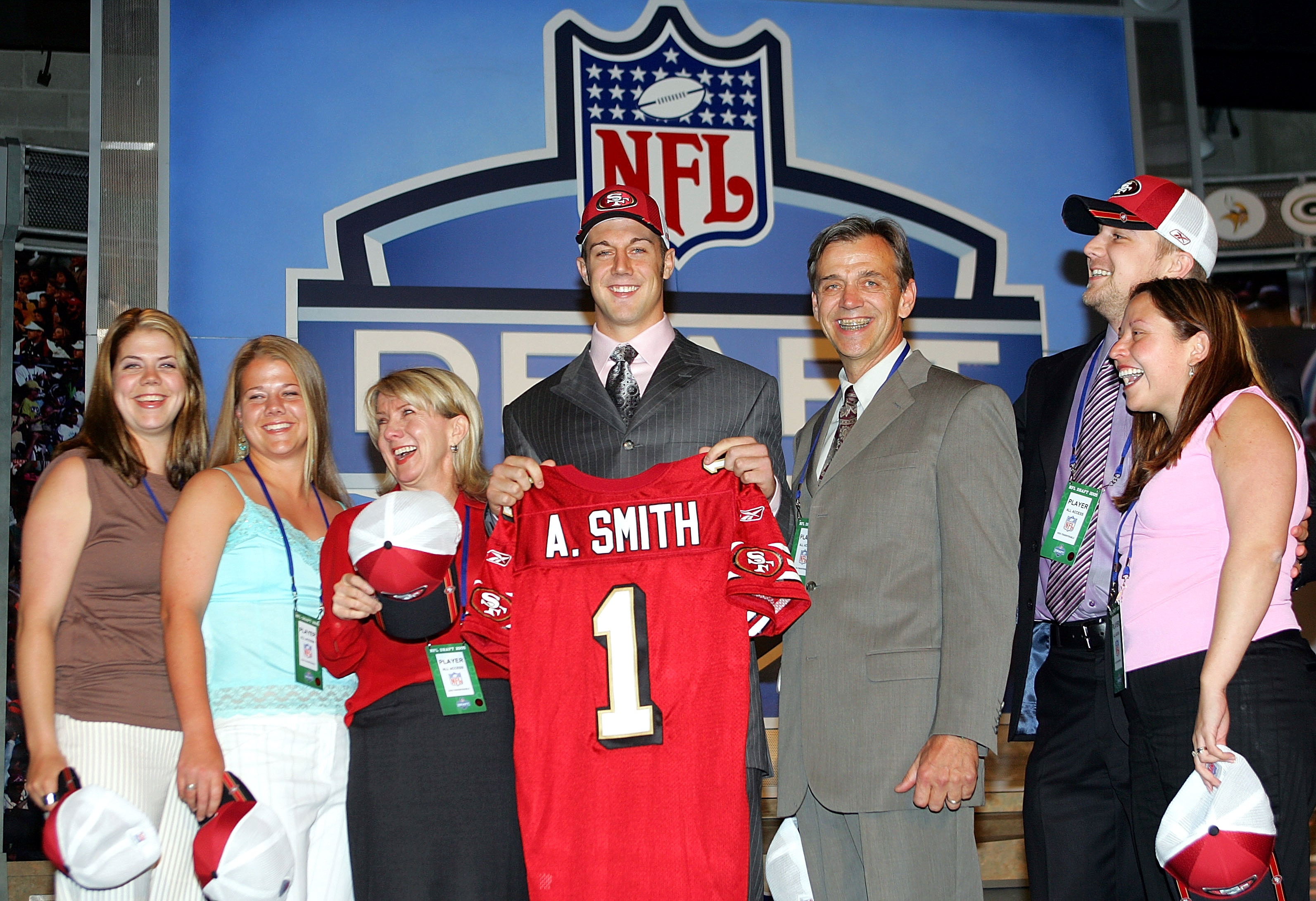 NEW YORK CITY - APRIL 23:  Quarterback Alex Smith (C) (Utah), who was drafted first overall by the San Francisco 49ers, poses with his family during the 70th NFL Draft on April 23, 2005 at the Jacob K. Javits Convention Center in New York City.  (Photo by