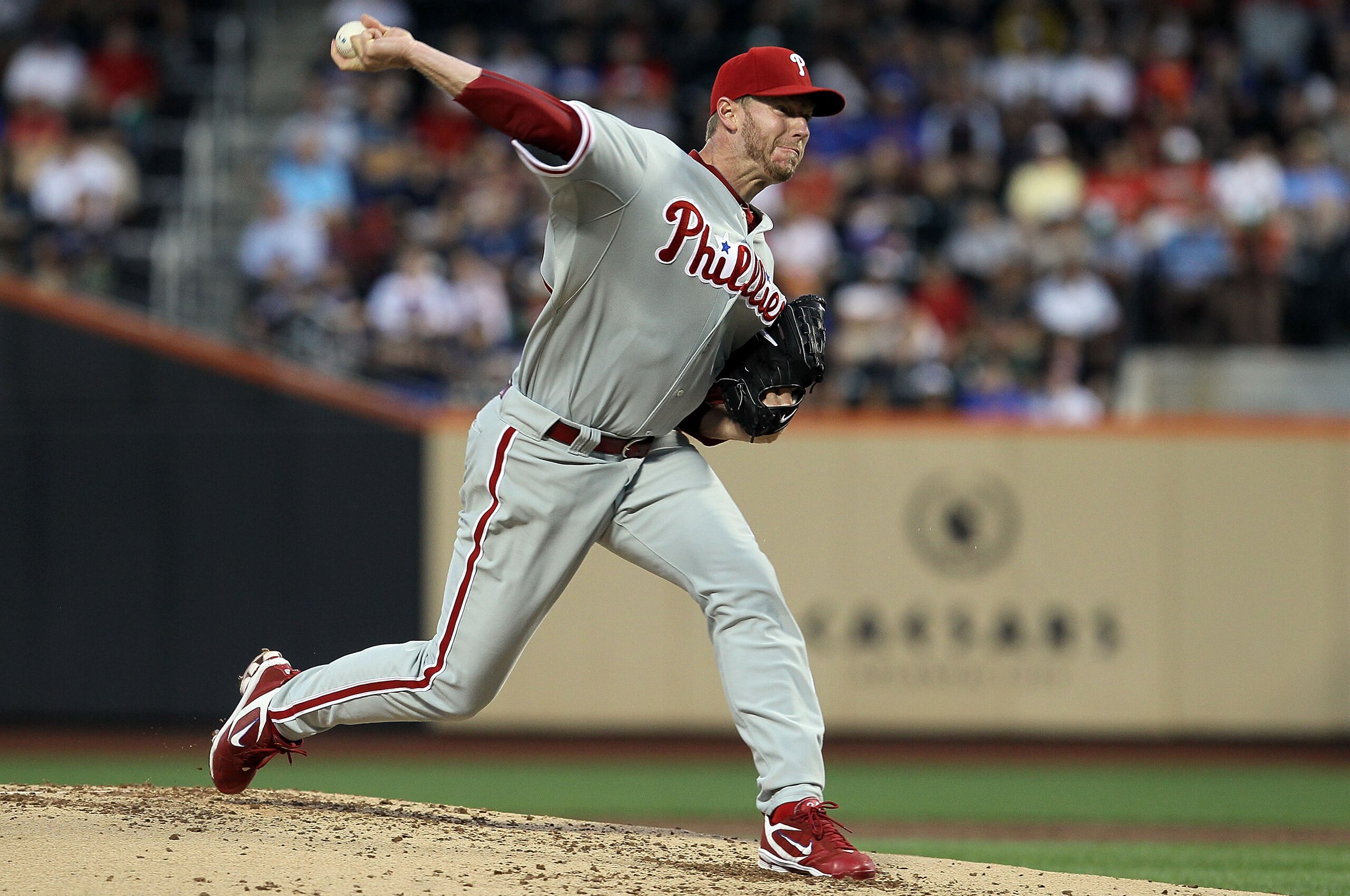 NEW YORK - AUGUST 14:  Roy Halladay #34 of the Philadelphia Phillies delivers a pitch against the New York Mets on August 14, 2010 at Citi Field in the Flushing neighborhood of the Queens borough of New York City.  (Photo by Jim McIsaac/Getty Images)