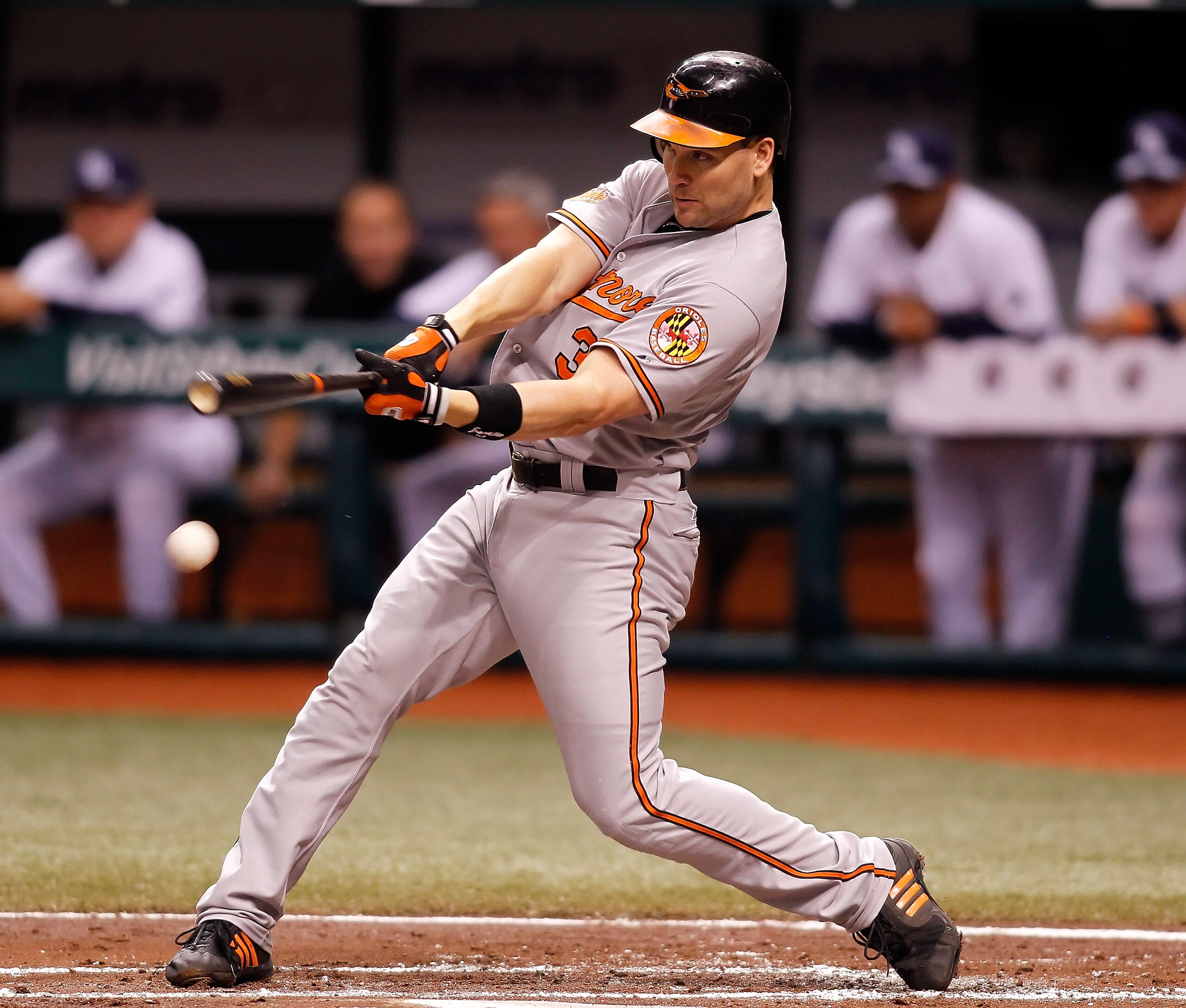 ST. PETERSBURG, FL - SEPTEMBER 29:  Infielder Luke Scott #30 of the Baltimore Orioles fouls off a pitch against the Tampa Bay Rays during the game at Tropicana Field on September 29, 2010 in St. Petersburg, Florida.  (Photo by J. Meric/Getty Images)