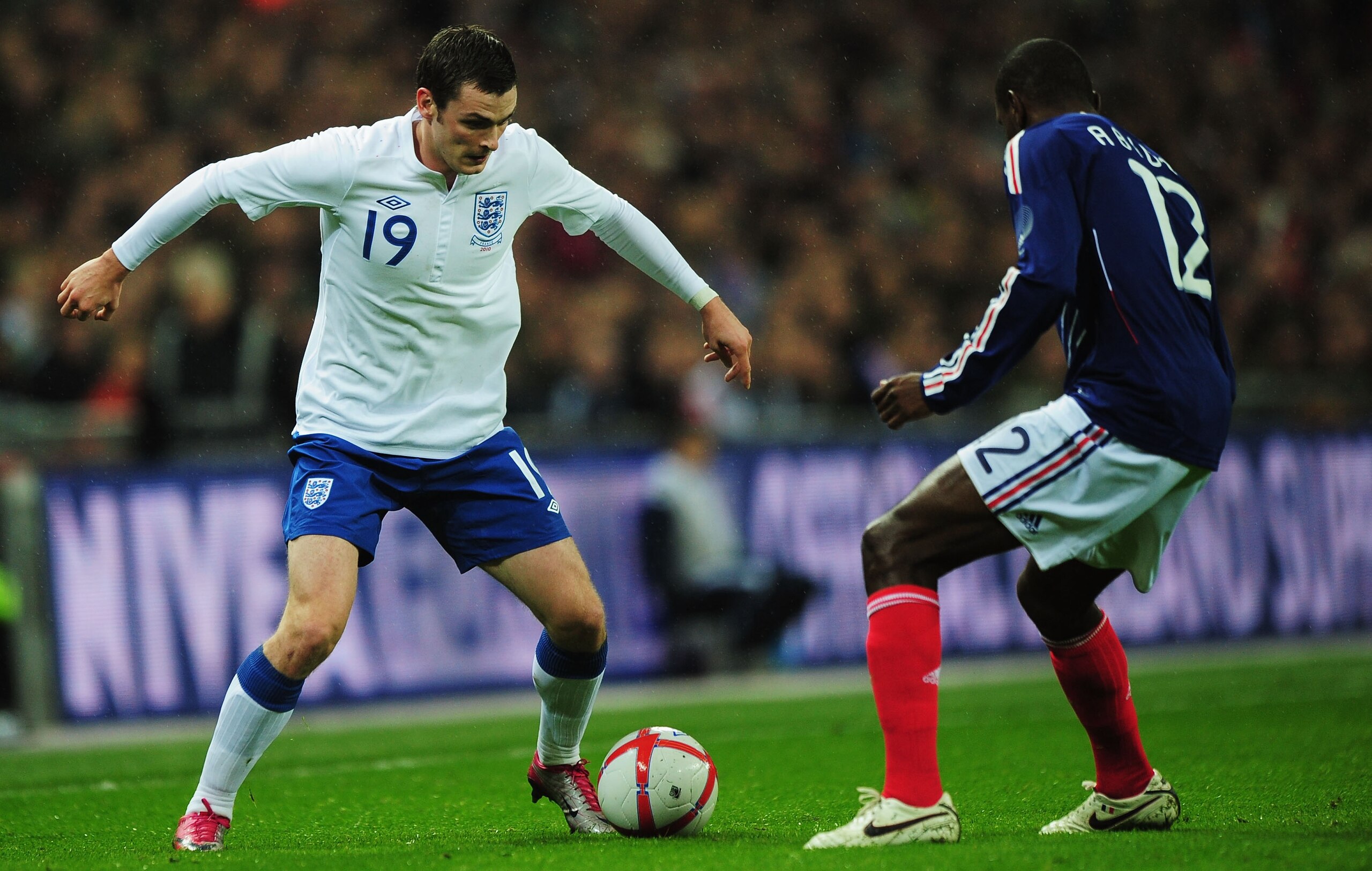LONDON, ENGLAND - NOVEMBER 17: Adam Johnson of England takes on Eric Abidal of France during the international friendly match between England and France at Wembley Stadium on November 17, 2010 in London, England. (Photo by Shaun Botterill/Getty Images) LONDON, ENGLAND - NOVEMBER 17: Adam Johnson of England takes on Eric Abidal of France during the international friendly match between England and France at Wembley Stadium on November 17, 2010 in London, England. (Photo by Shaun Botterill/Getty Images)