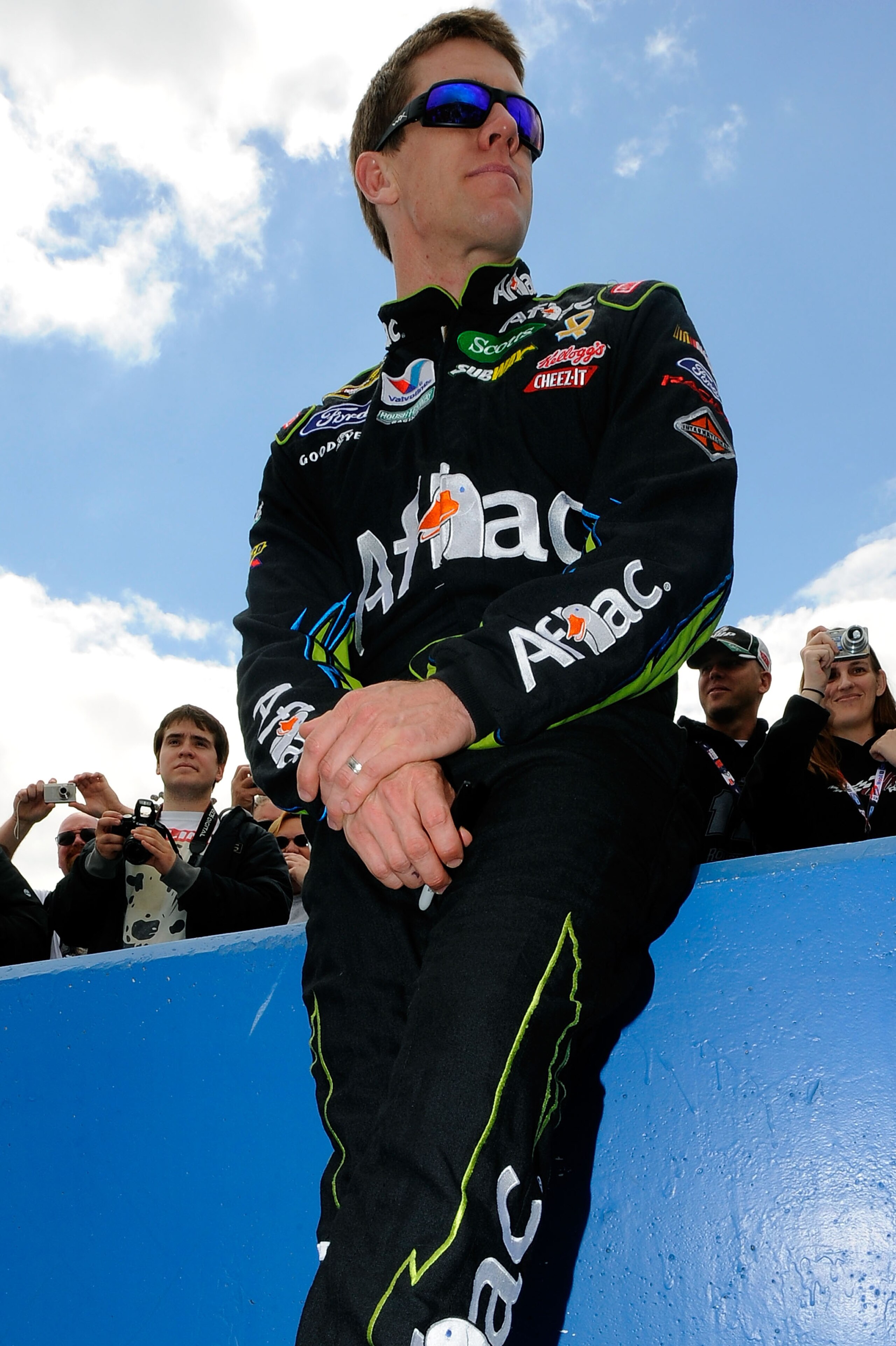 FONTANA, CA - MARCH 27:  Carl Edwards, driver of the #99 Aflac Ford, stands on pit road prior to the NASCAR Sprint Cup Series Auto Club 400 at Auto Club Speedway on March 27, 2011 in Fontana, California.  (Photo by Jared C. Tilton/Getty Images for NASCAR)