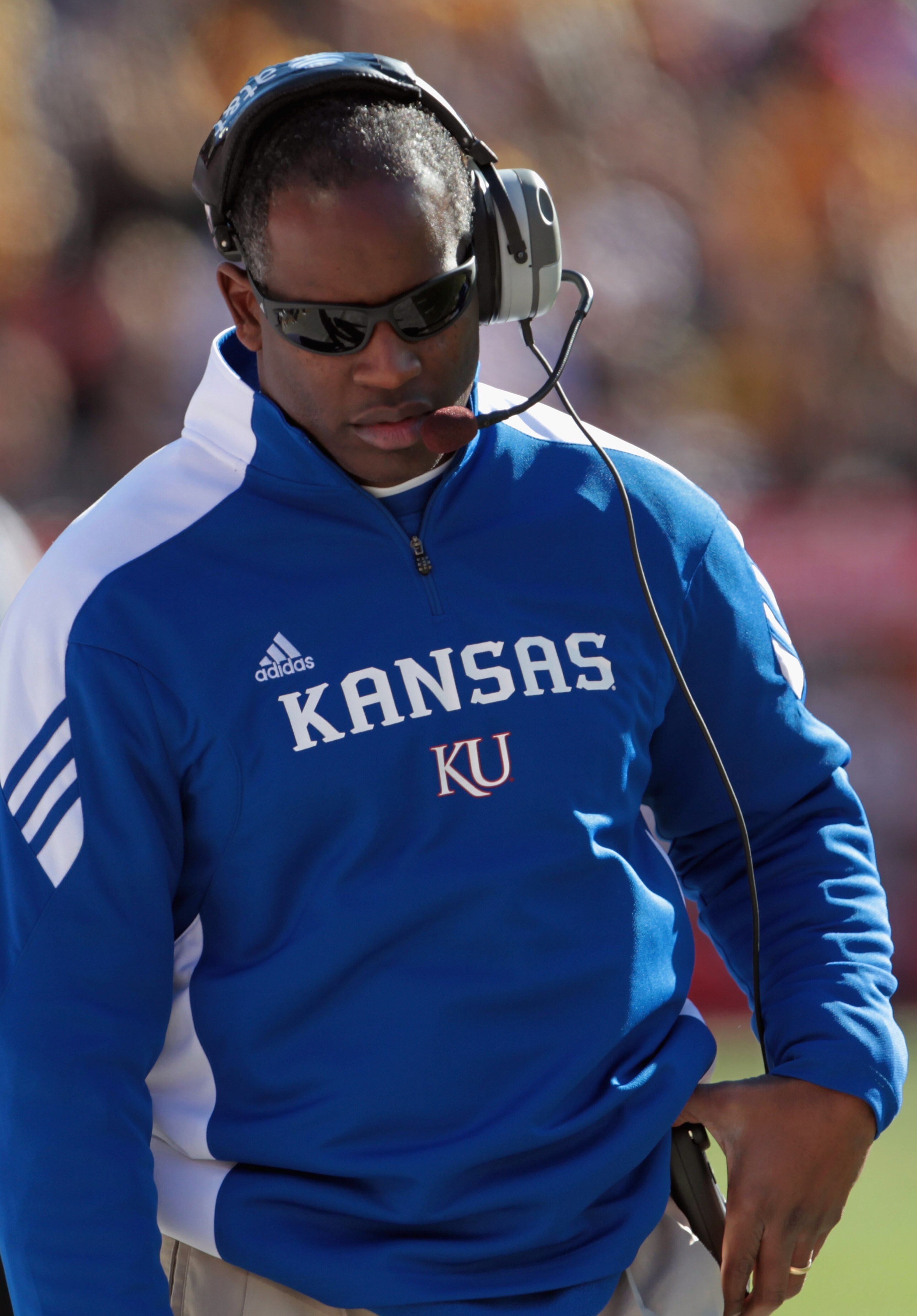 KANSAS CITY, MO - NOVEMBER 27: Head coach Turner Gill of the Kansas Jayhawks coaches from the sidelines during the game against the Missouri Tigers on November 27, 2010 at Arrowhead Stadium in Kansas City, Missouri. (Photo by Jamie Squire/Getty Images) KANSAS CITY, MO - NOVEMBER 27: Head coach Turner Gill of the Kansas Jayhawks coaches from the sidelines during the game against the Missouri Tigers on November 27, 2010 at Arrowhead Stadium in Kansas City, Missouri. (Photo by Jamie Squire/Getty Images)