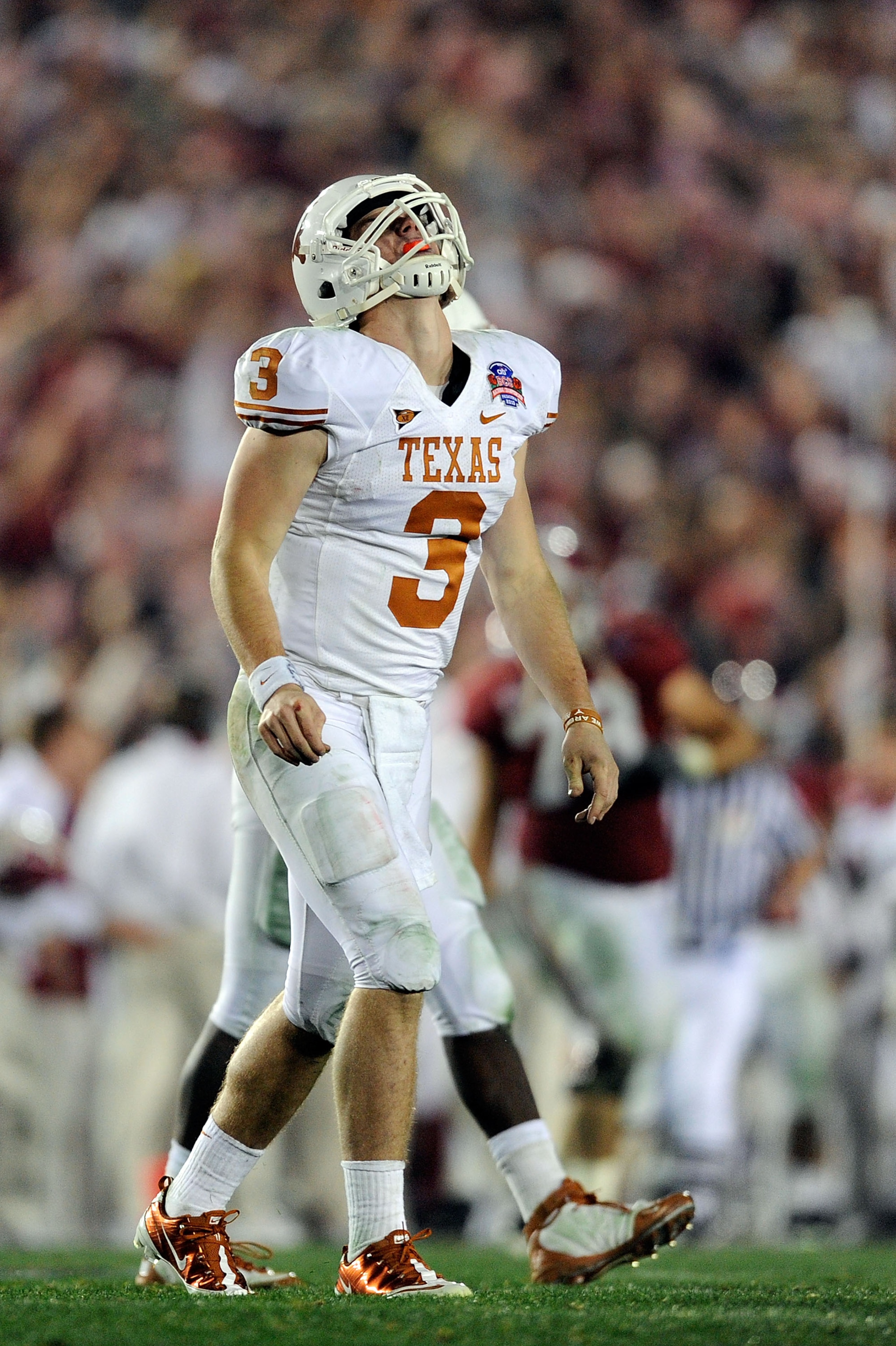 PASADENA, CA - JANUARY 07:  Quarterback Garrett Gilbert #3 of the Texas Longhorns reacts after throwing an interception to the Alabama Crimson Tide during the Citi BCS National Championship game at the Rose Bowl on January 7, 2010 in Pasadena, California.