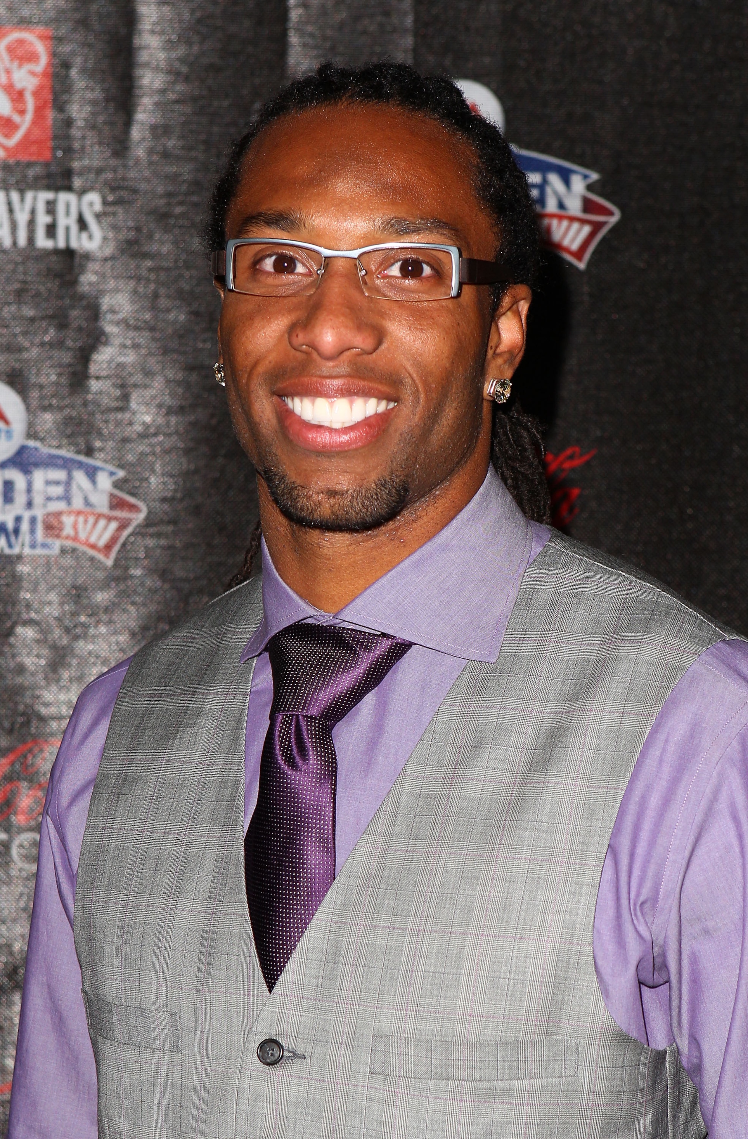 GRAPEVINE, TX - FEBRUARY 03:  NFL player Larry Fitzgerald of the Arizona Cardinals attends the Coke Zero black carpet at the EA SPORTS Madden Bowl XVII at The Glass Cactus on February 3, 2011 in Grapevine, Texas.  (Photo by Joe Scarnici/Getty Images for M