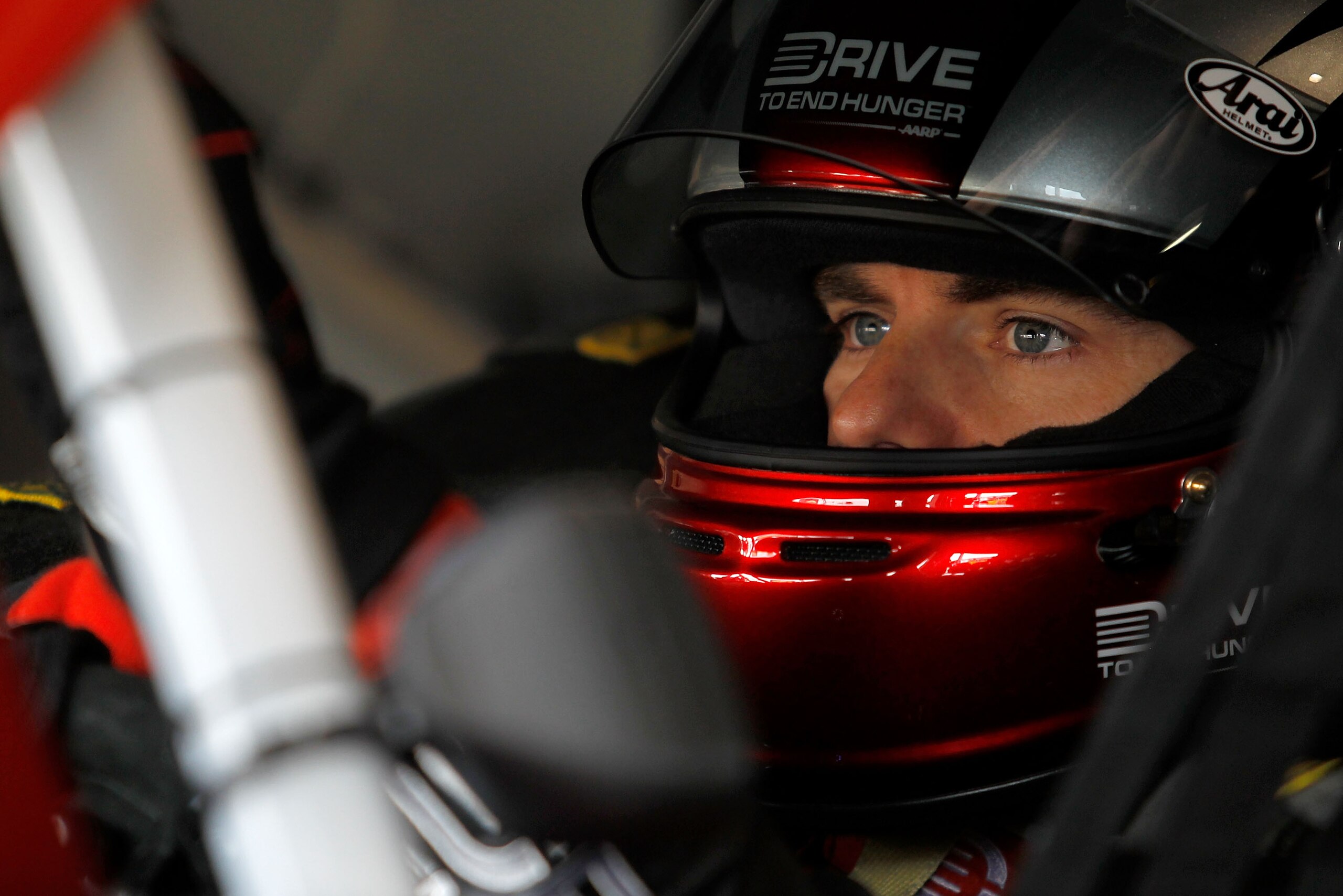 FONTANA, CA - MARCH 26:  Jeff Gordon, driver of the #24 Drive to End Hunger Chevrolet, sits in his car during practice for the NASCAR Sprint Cup Series Auto Club 400 at Auto Club Speedway on March 26, 2011 in Fontana, California.  (Photo by Todd Warshaw/G