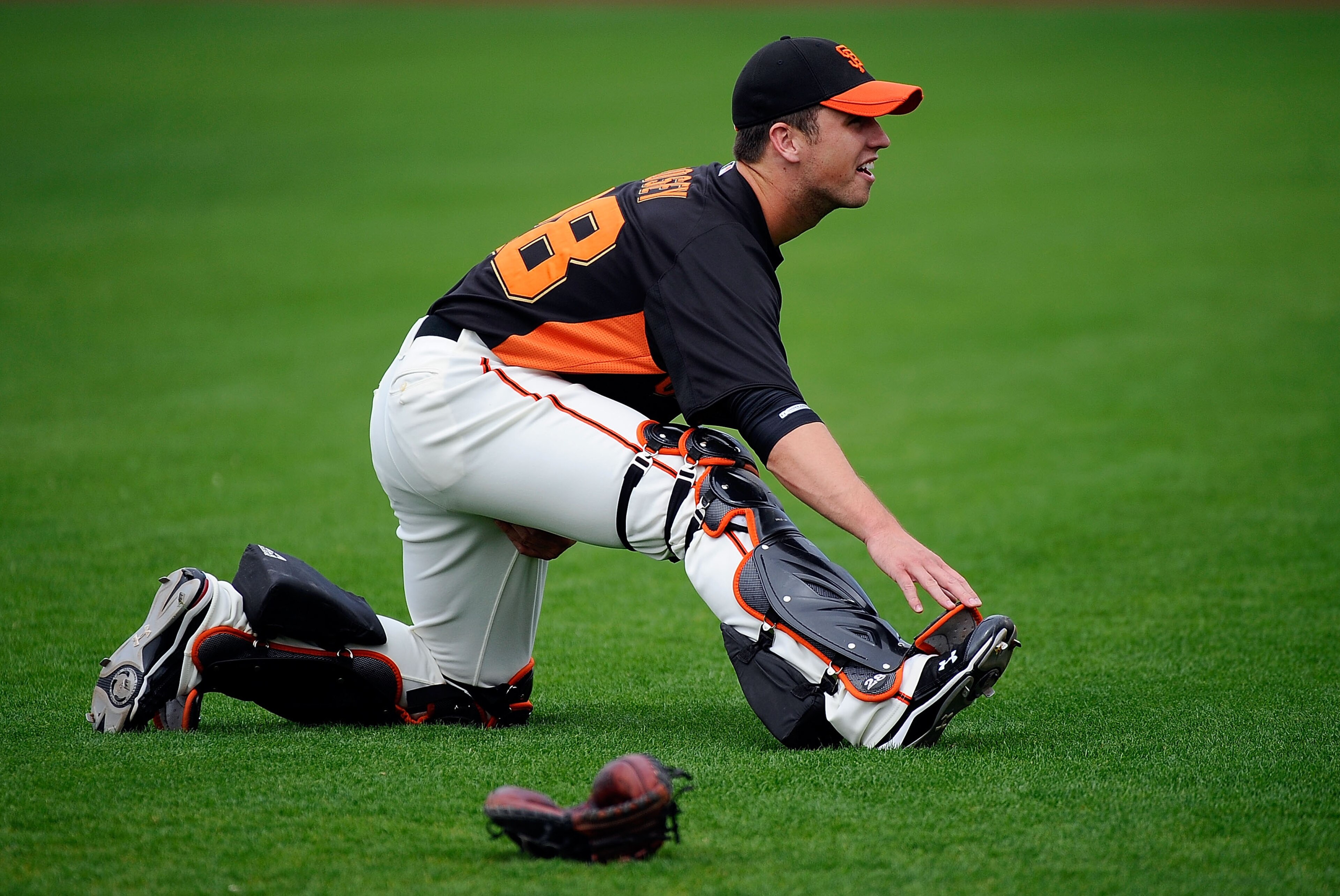 SCOTTSDALE, AZ - MARCH 14: Buster Posey #28 of the San Francisco Giants stretches before playing against the Milwaukee Brewers during the spring training baseball game at Scottsdale Stadium on March 14, 2011 in Scottsdale, Arizona. (Photo by Kevork Djan SCOTTSDALE, AZ - MARCH 14: Buster Posey #28 of the San Francisco Giants stretches before playing against the Milwaukee Brewers during the spring training baseball game at Scottsdale Stadium on March 14, 2011 in Scottsdale, Arizona. (Photo by Kevork Djan