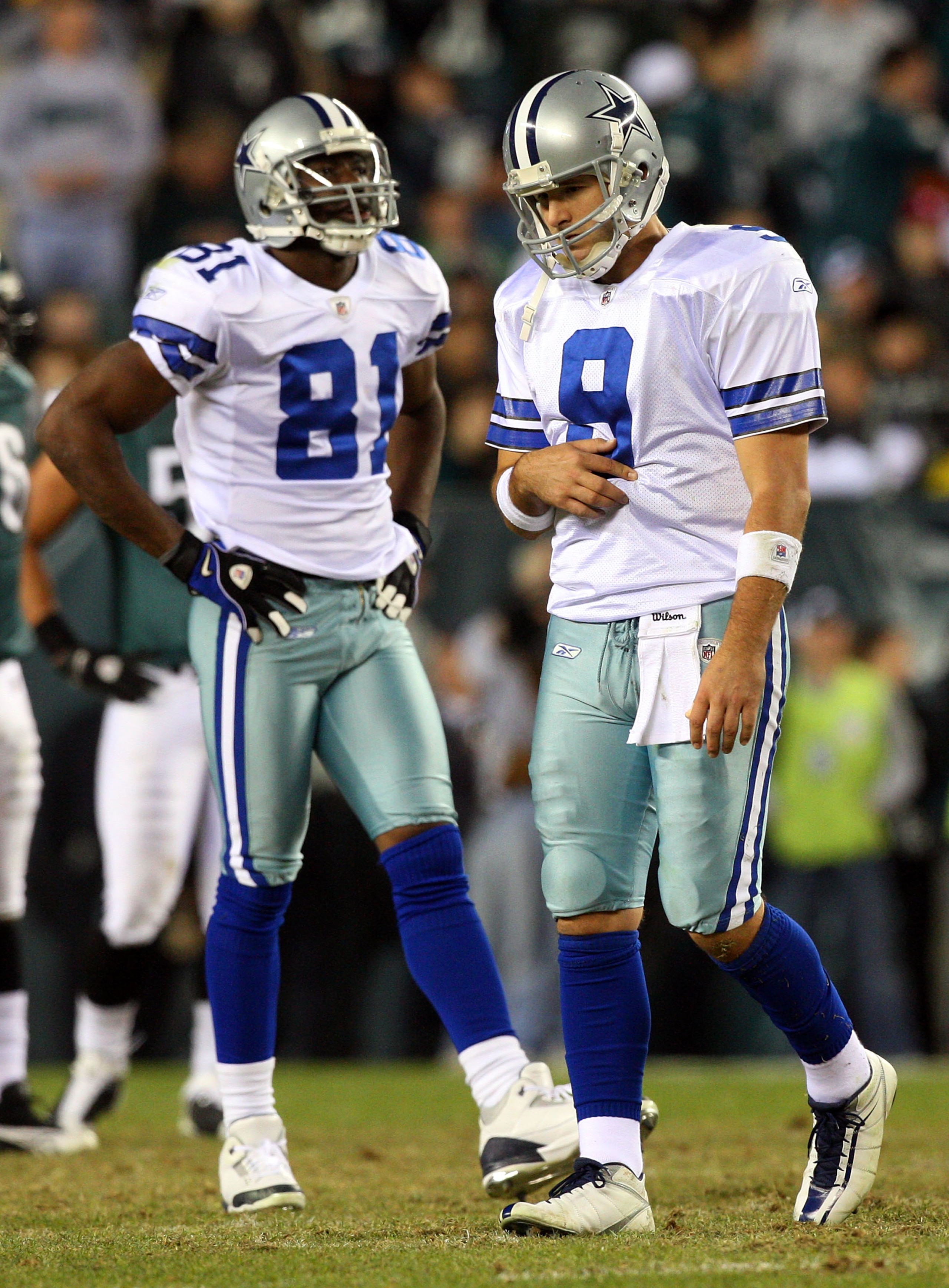 PHILADELPHIA - DECEMBER 28: Tony Romo #9 and Terrell Owens #81 of the Dallas Cowboys look on in the fourth quarter against the Philadelphia Eagles on December 28, 2008 at Lincoln Financial Field in Philadelphia, Pennsylvania. The Eagles defeated the Cowbo