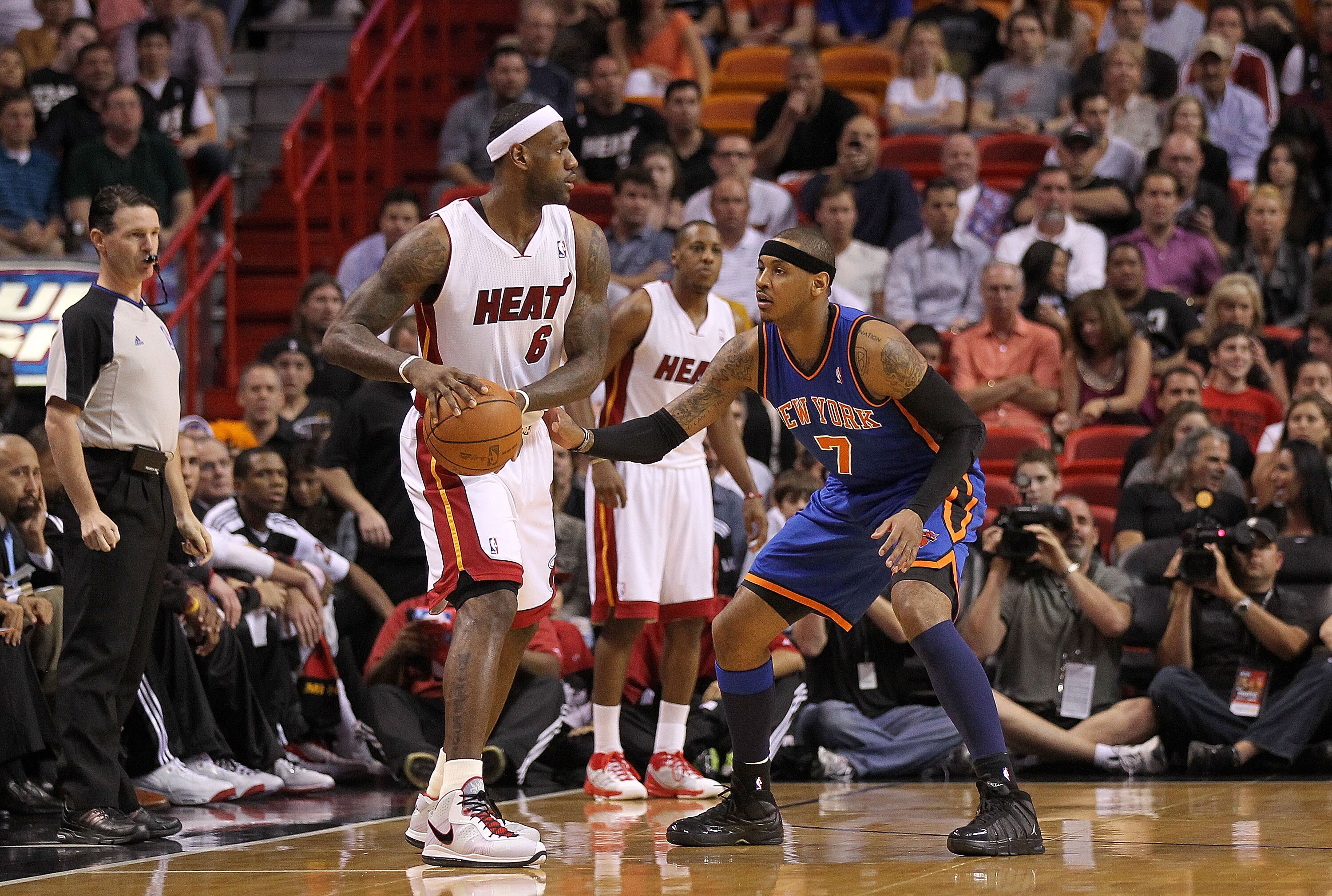 MIAMI, FL - FEBRUARY 27:  LeBron James #6 of the Miami Heat is guarded by Carmelo Anthony #7 of the New York Knicks looks on during a game at American Airlines Arena on February 27, 2011 in Miami, Florida. NOTE TO USER: User expressly acknowledges and agr