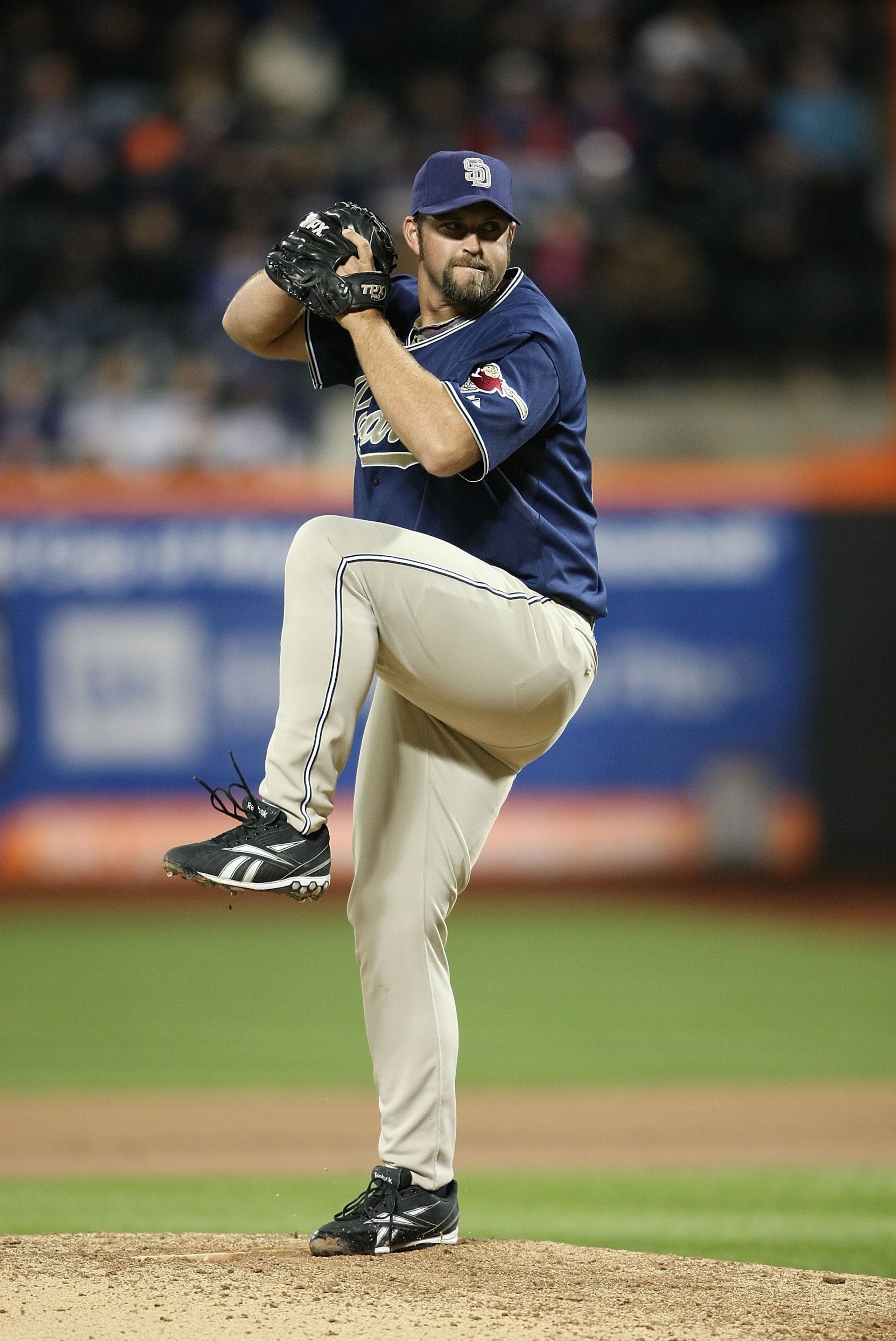 FLUSHING, NY - APRIL 13:  Heath Bell #21 of the San Diego Padres pitches against the New York Mets during opening day at Citi Field on April 13, 2009 in the Flushing neighborhood of the Queens borough of New York City. This is the first regular season MLB