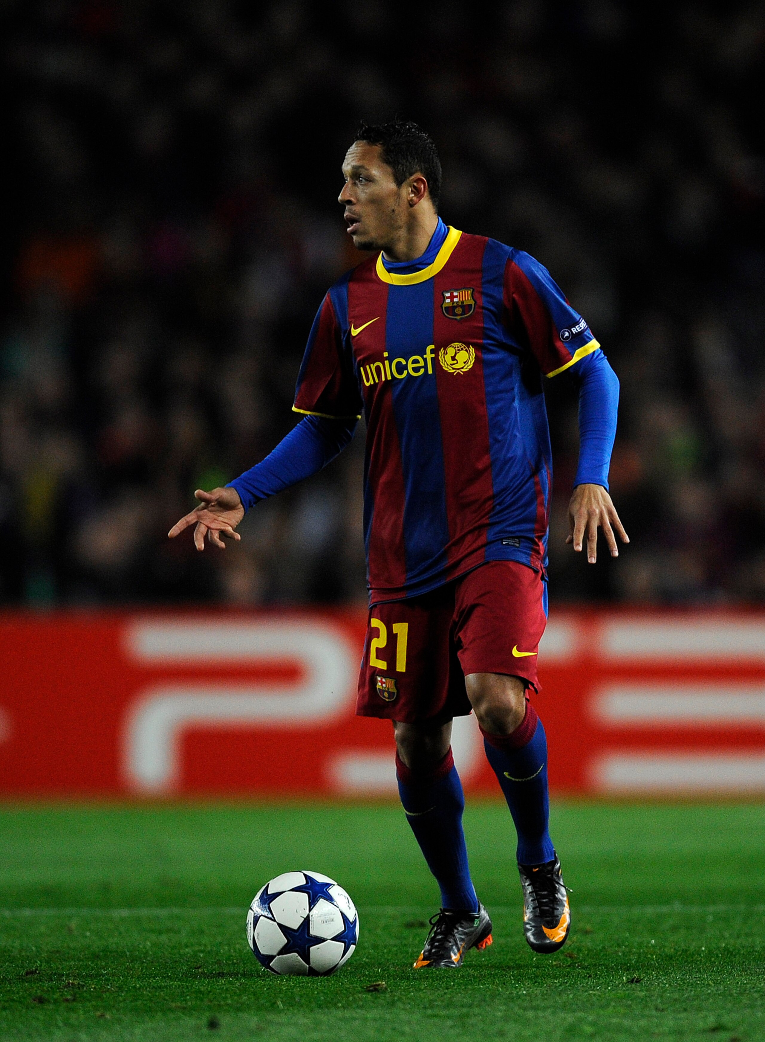 BARCELONA, SPAIN - MARCH 08:  Adriano of FC Barcelona runs with the ball during the UEFA Champions League round of 16 second leg match between Barcelona and Arsenal at the Camp Nou stadium on March 8, 2011 in Barcelona, Spain.  Barcelona won 3-1.  (Photo