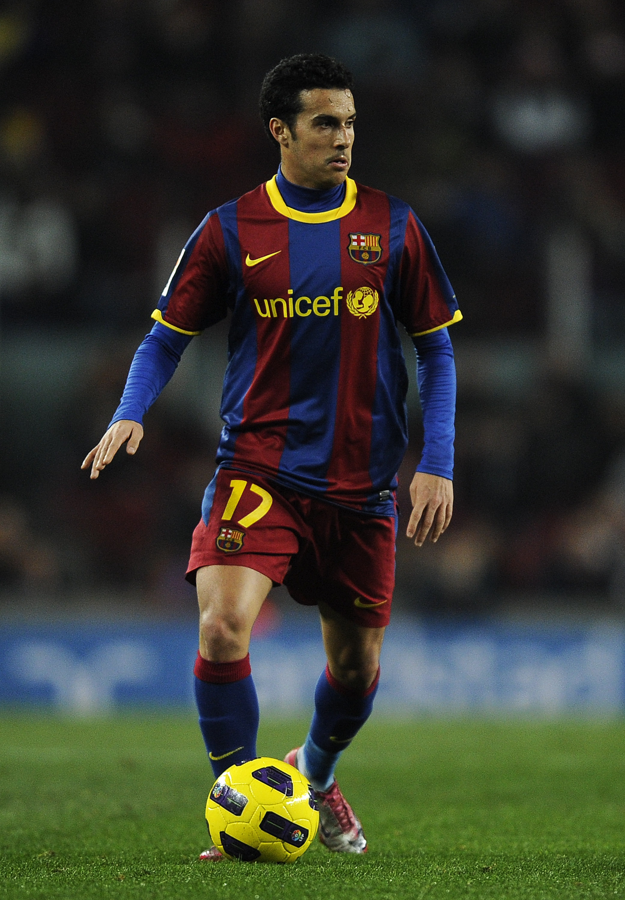 BARCELONA, SPAIN - JANUARY 26:  Pedro Rodriguez of Barcelona runs with the ball during the Copa del Rey Semi Final First Leg match between Barcelona and Almeria at Camp Nou on January 26, 2011 in Barcelona, Spain. Barcelona won 5-0.  (Photo by David Ramos