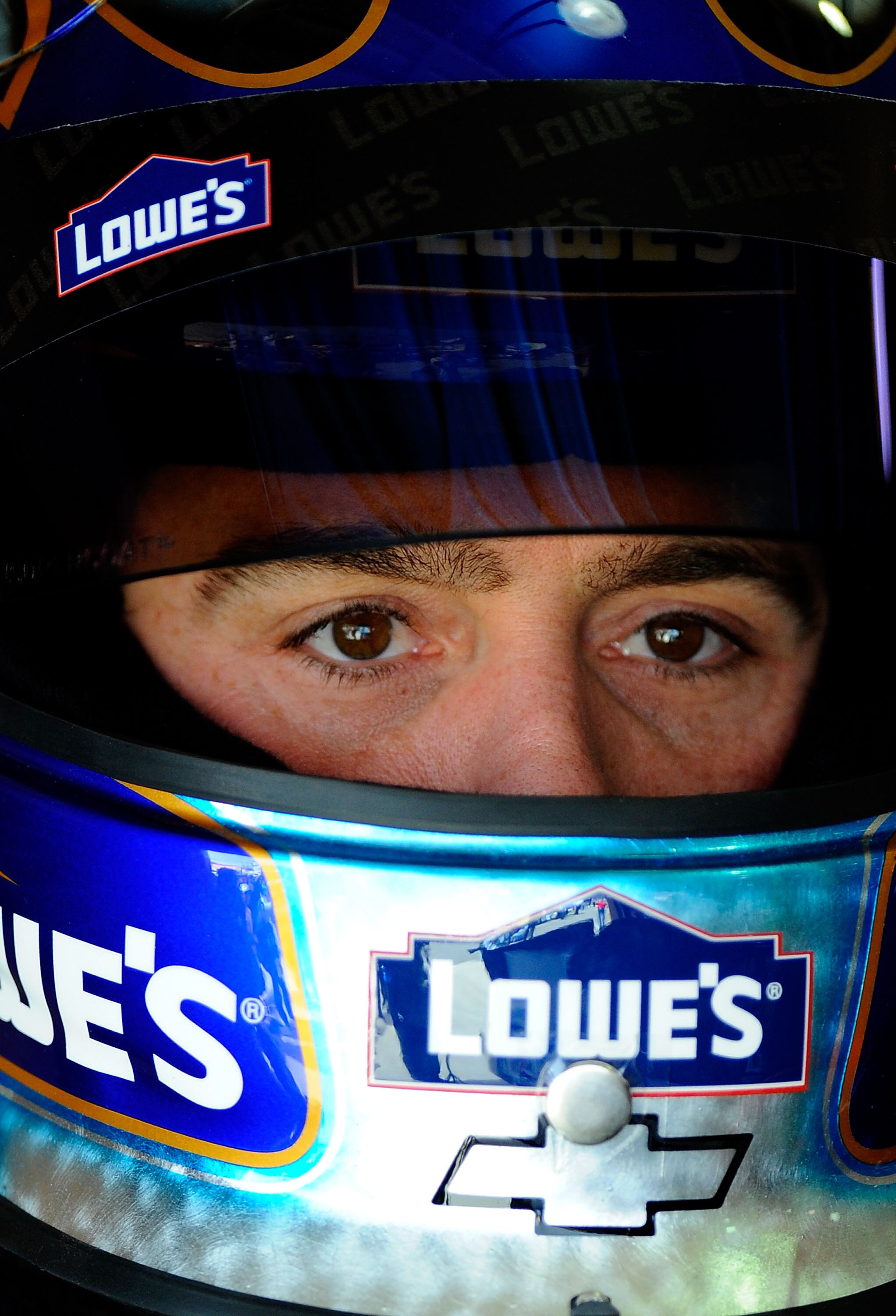 FONTANA, CA - MARCH 26:  Jimmie Johnson, driver of the #48 Lowe's Chevrolet, sits in his car during practice for the NASCAR Sprint Cup Series Auto Club 400 at Auto Club Speedway on March 26, 2011 in Fontana, California.  (Photo by Jared C. Tilton/Getty Im