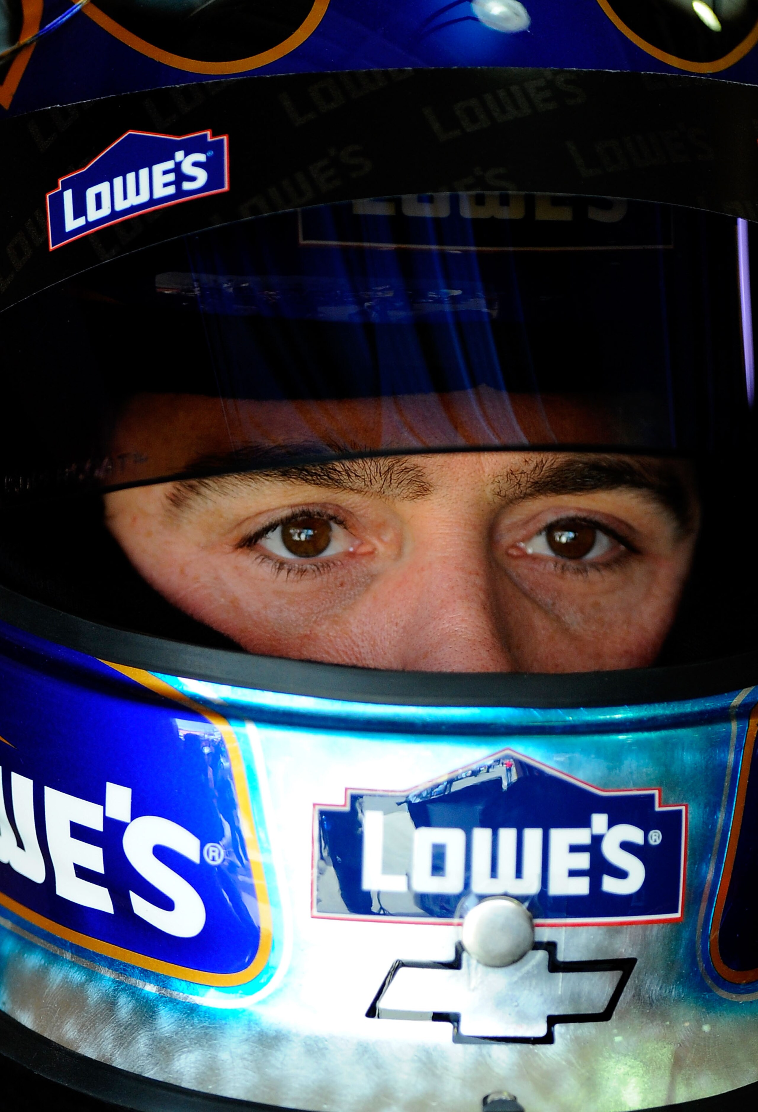 FONTANA, CA - MARCH 26:  Jimmie Johnson, driver of the #48 Lowe's Chevrolet, sits in his car during practice for the NASCAR Sprint Cup Series Auto Club 400 at Auto Club Speedway on March 26, 2011 in Fontana, California.  (Photo by Jared C. Tilton/Getty Im