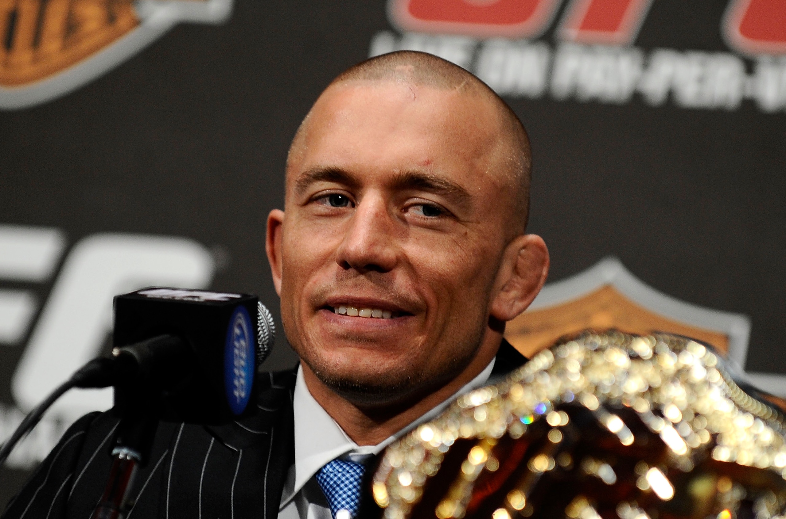 NEW YORK - MARCH 24: Georges St-Pierre of Montreal, Quebec, Canada speaks at a press conference for UFC 111 at Radio City Music Hall on March 24, 2010 in New York City. St-Pierre will face Dan Hardy of Nottingham UK in the Welterweight title bout. (Phot NEW YORK - MARCH 24: Georges St-Pierre of Montreal, Quebec, Canada speaks at a press conference for UFC 111 at Radio City Music Hall on March 24, 2010 in New York City. St-Pierre will face Dan Hardy of Nottingham UK in the Welterweight title bout. (Phot