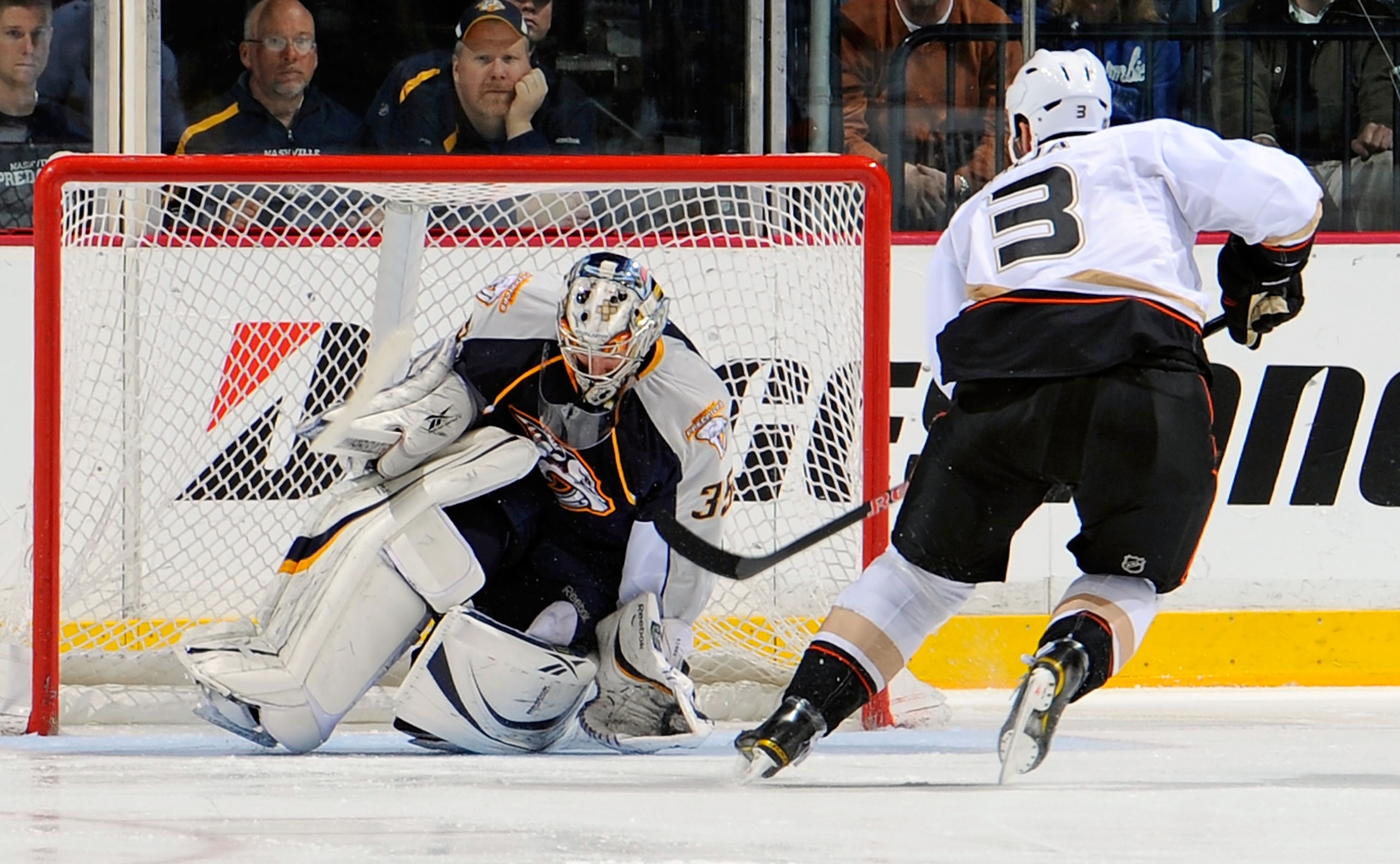 NASHVILLE, TN - MARCH 24: Pekka Rinne #35 of the Nashville Predators stops a breakaway shot by Andreas Lilja #3 of the Anaheim Ducks on March 24, 2011 at the Bridgestone Arena in Nashville, Tennessee. (Photo by Frederick Breedon/Getty Images) NASHVILLE, TN - MARCH 24: Pekka Rinne #35 of the Nashville Predators stops a breakaway shot by Andreas Lilja #3 of the Anaheim Ducks on March 24, 2011 at the Bridgestone Arena in Nashville, Tennessee. (Photo by Frederick Breedon/Getty Images)