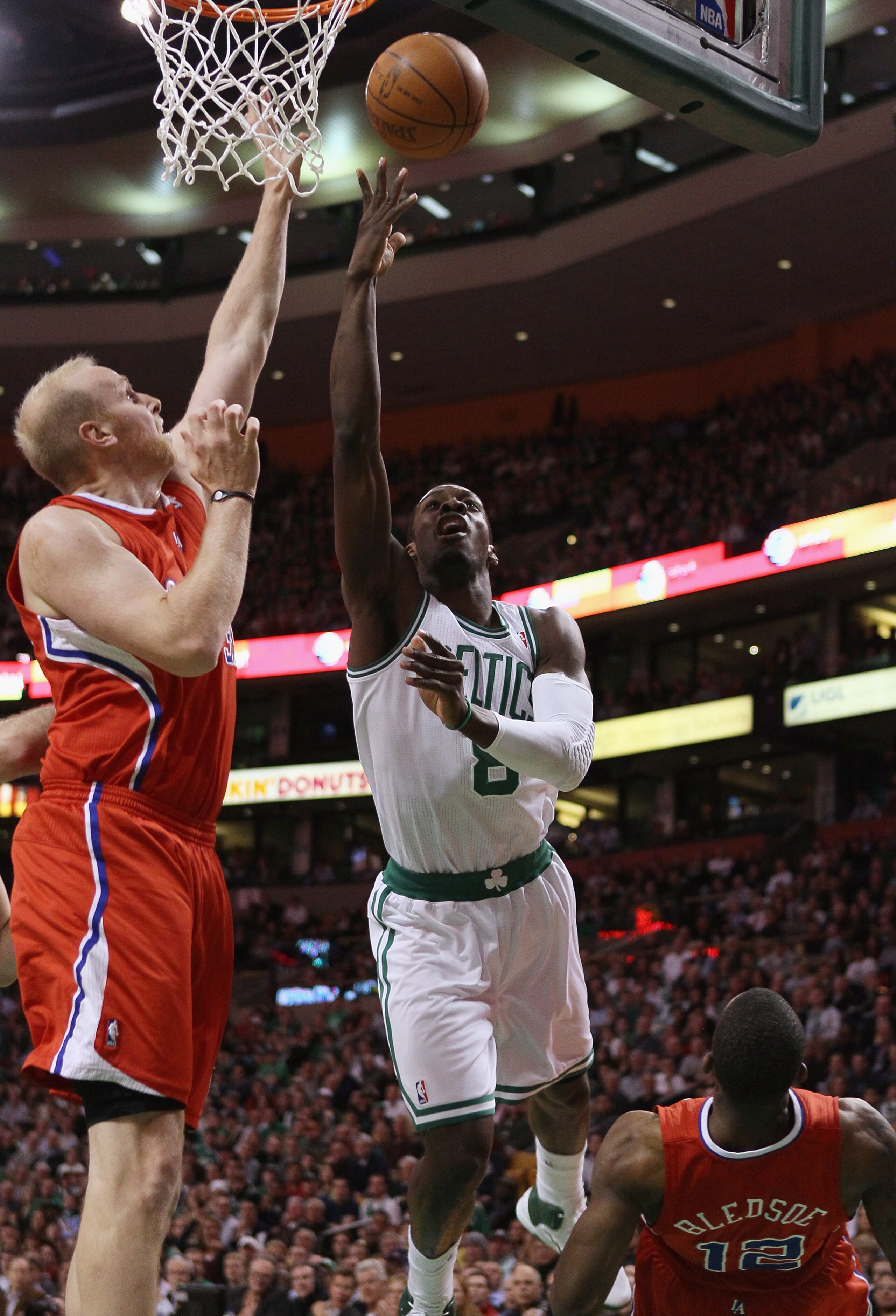 BOSTON, MA - MARCH 09:  Jeff Green #8 of the Boston Celtics heads for the basket as Eric Bledsoe #12 and Chris Kaman #35 of the Los Angeles Clippers defend on March 9, 2011 at the TD Garden in Boston, Massachusetts. NOTE TO USER: User expressly acknowledg