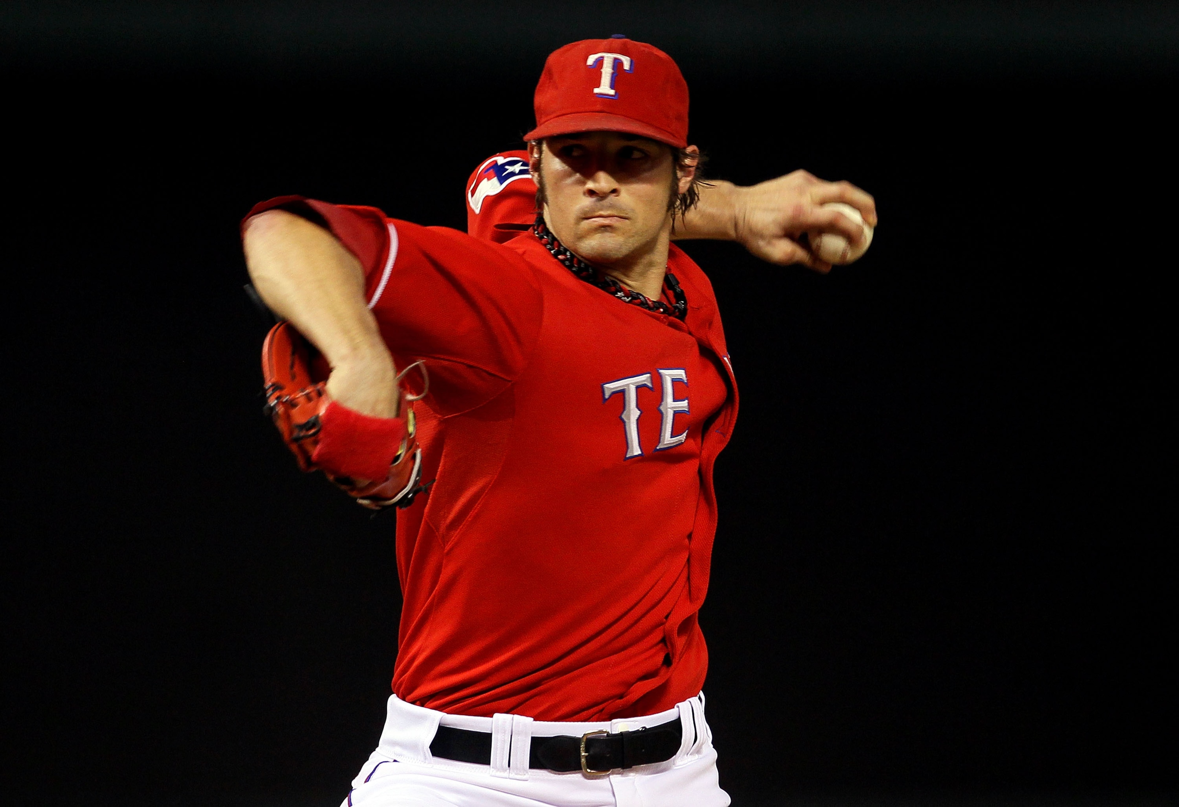 ARLINGTON, TX - OCTOBER 15: C.J. Wilson #36 of the Texas Rangers pitches against the New York Yankees in Game One of the ALCS during the 2010 MLB Playoffs at Rangers Ballpark in Arlington on October 15, 2010 in Arlington, Texas. (Photo by Stephen Dunn/Ge ARLINGTON, TX - OCTOBER 15: C.J. Wilson #36 of the Texas Rangers pitches against the New York Yankees in Game One of the ALCS during the 2010 MLB Playoffs at Rangers Ballpark in Arlington on October 15, 2010 in Arlington, Texas. (Photo by Stephen Dunn/Ge