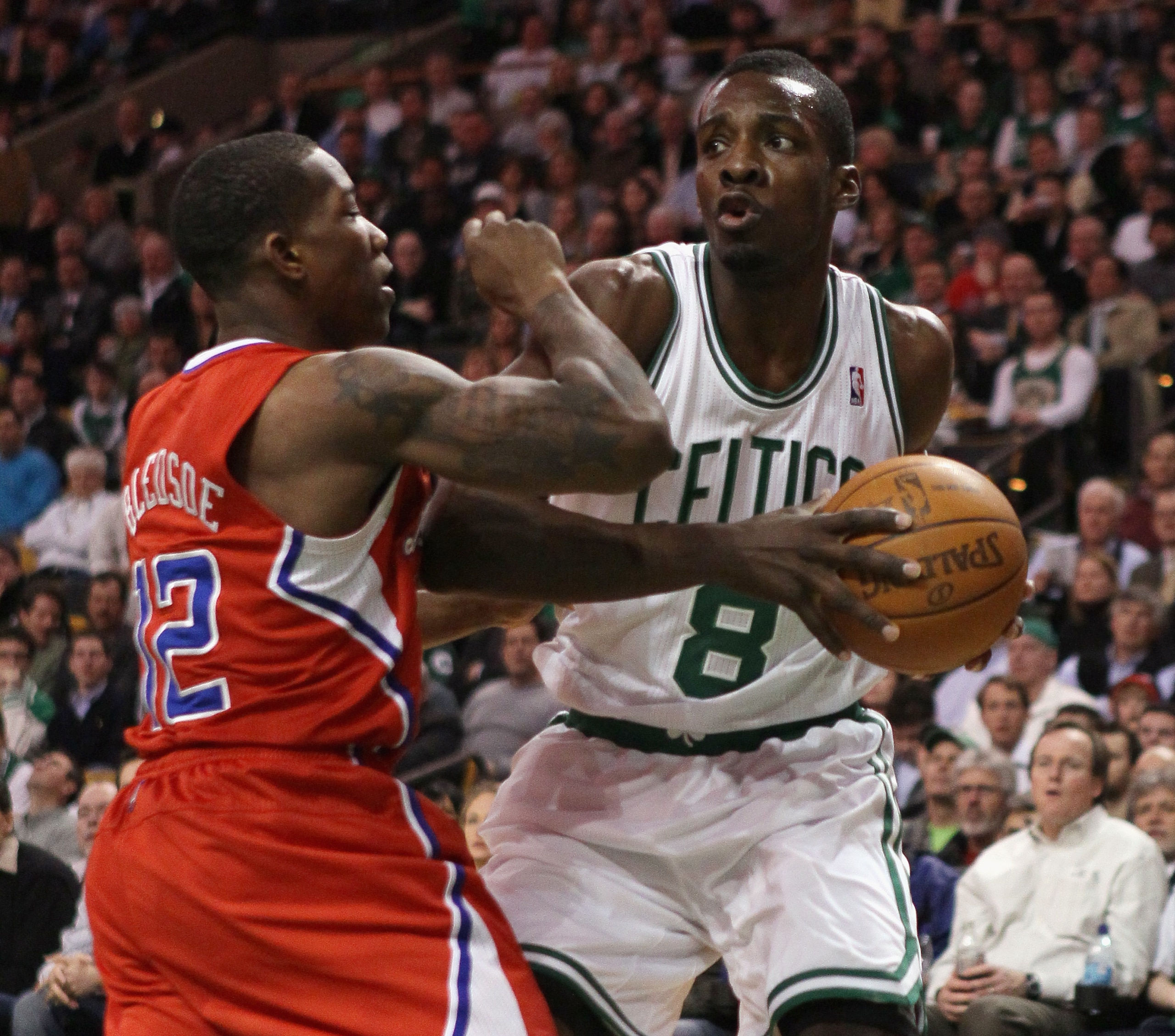 BOSTON, MA - MARCH 09:  Jeff Green #8 of the Boston Celtics tries to get around Eric Bledsoe #12 of the Los Angeles Clippers on March 9, 2011 at the TD Garden in Boston, Massachusetts. NOTE TO USER: User expressly acknowledges and agrees that, by download