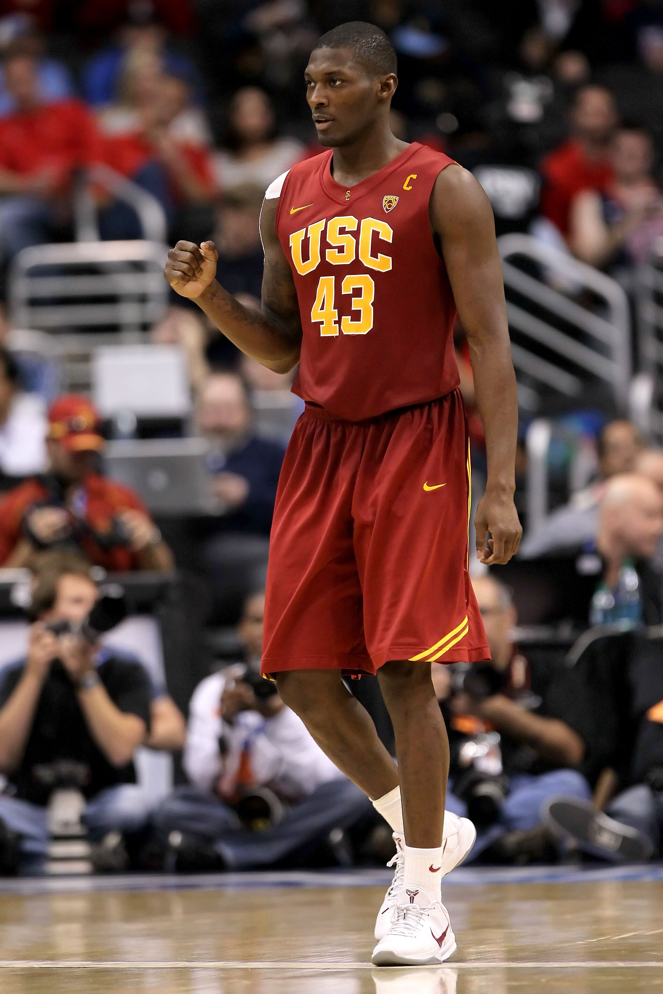 LOS ANGELES, CA - MARCH 11:  Marcus Simmons #43 of the USC Trojans reacts in the second half while taking on the Arizona Wildcats in the semifinals of the 2011 Pacific Life Pac-10 Men's Basketball Tournament at Staples Center on March 11, 2011 in Los Ange