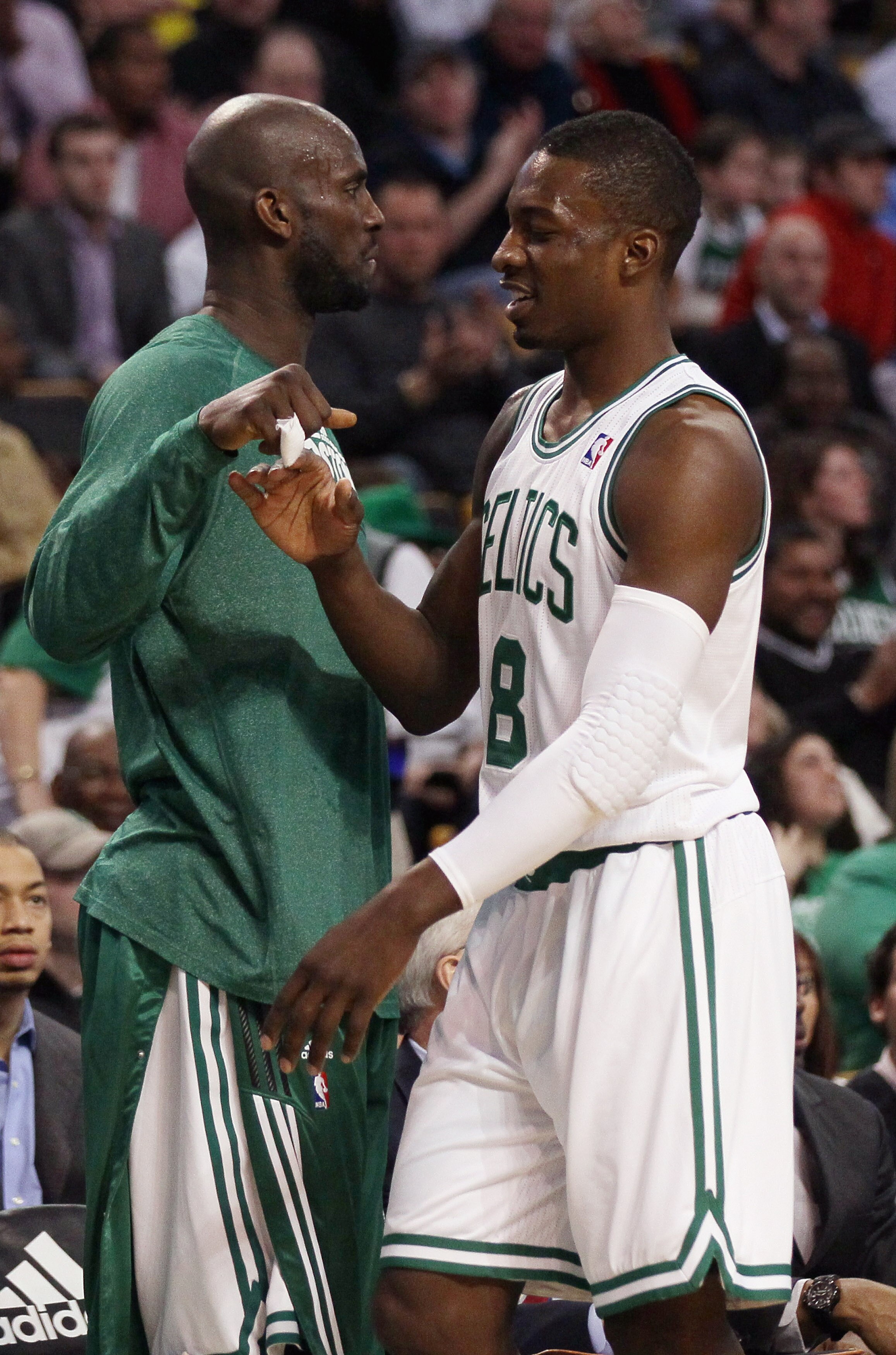 BOSTON, MA - MARCH 02:  Jeff Green #8 of the Boston Celtics is congratulated by teammate Kevin Garnett in the first half against the Phoenix Suns on March 2, 2011 at the TD Garden in Boston, Massachusetts.  NOTE TO USER: User expressly acknowledges and ag