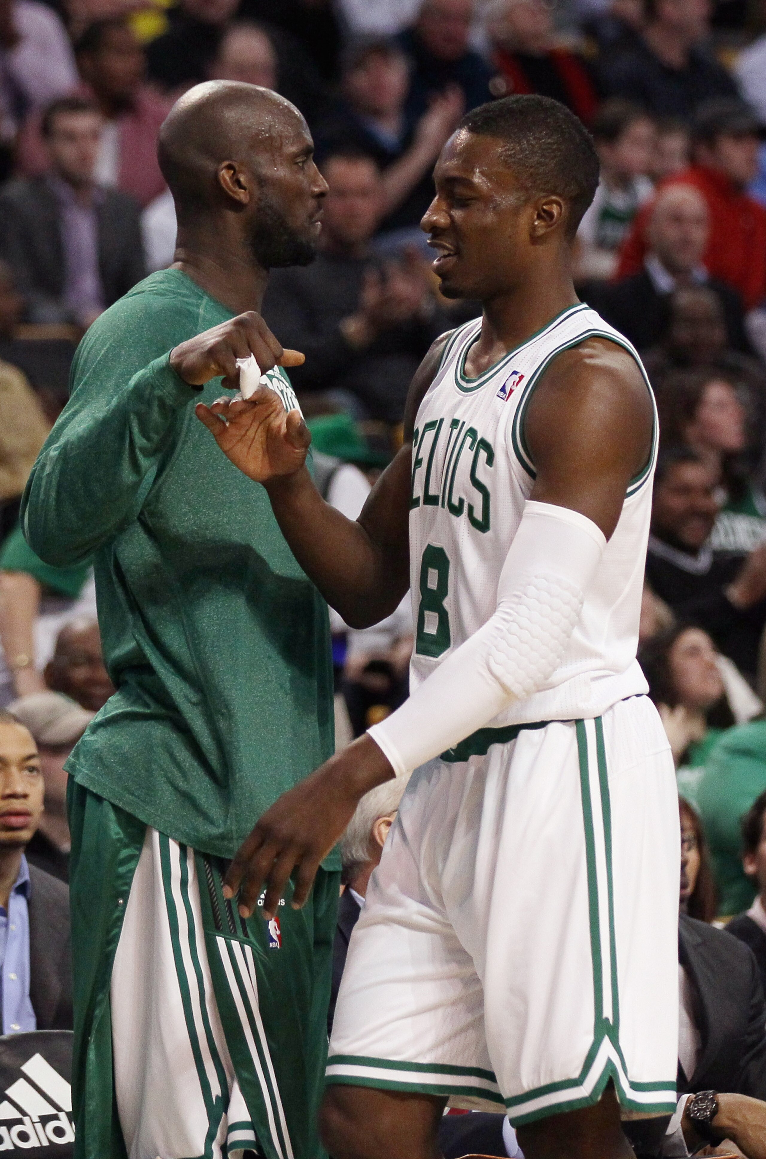 BOSTON, MA - MARCH 02:  Jeff Green #8 of the Boston Celtics is congratulated by teammate Kevin Garnett in the first half against the Phoenix Suns on March 2, 2011 at the TD Garden in Boston, Massachusetts.  NOTE TO USER: User expressly acknowledges and ag