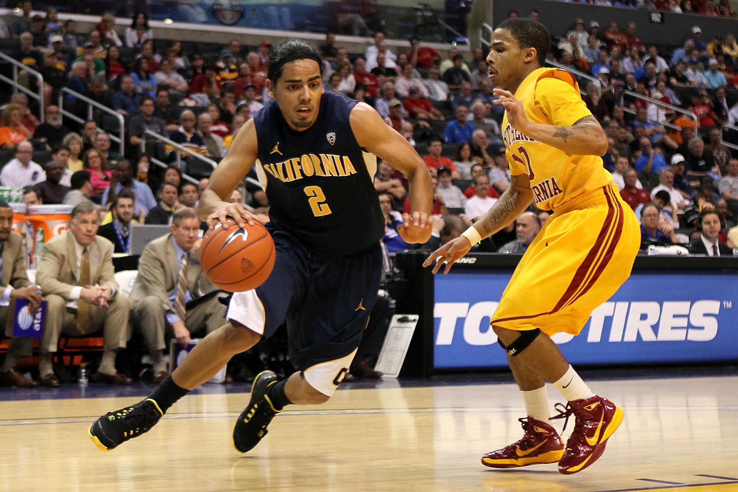 LOS ANGELES, CA - MARCH 10:  Jorge Gutierrez #2 of the California Golden Bears drives on Maurice Jones #10 of the USC Trojans in the second half in the quarterfinals of the 2011 Pacific Life Pac-10 Men's Basketball Tournament at Staples Center on March 10