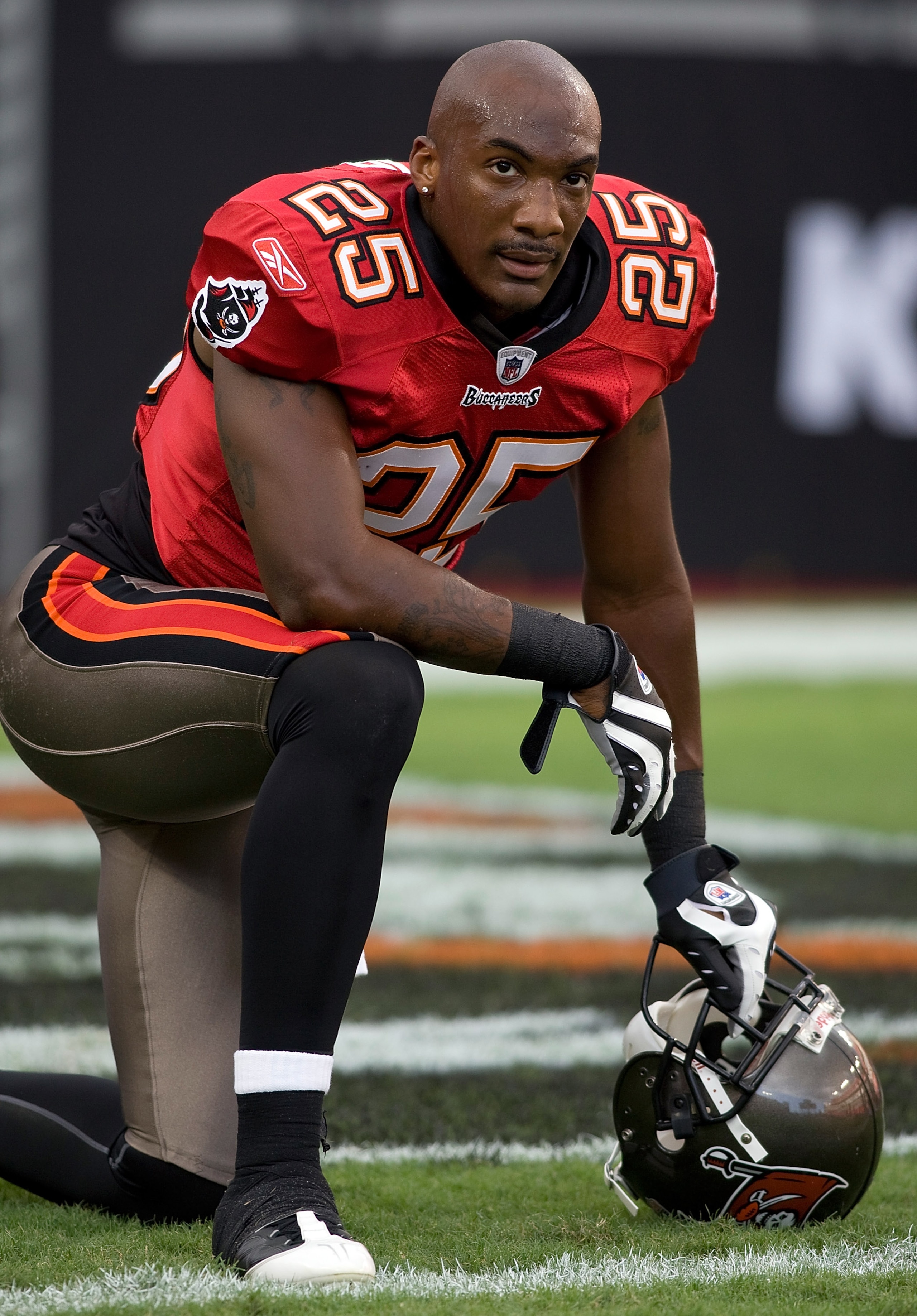 TAMPA, FL - SEPTEMBER 04:  Cornerback Aqib Talib #25 of the Tampa Bay Buccaneers rests against the Houston Texans during a preseason game at Raymond James Stadium on September 4, 2009 in Tampa, Florida.  (Photo by J. Meric/Getty Images)