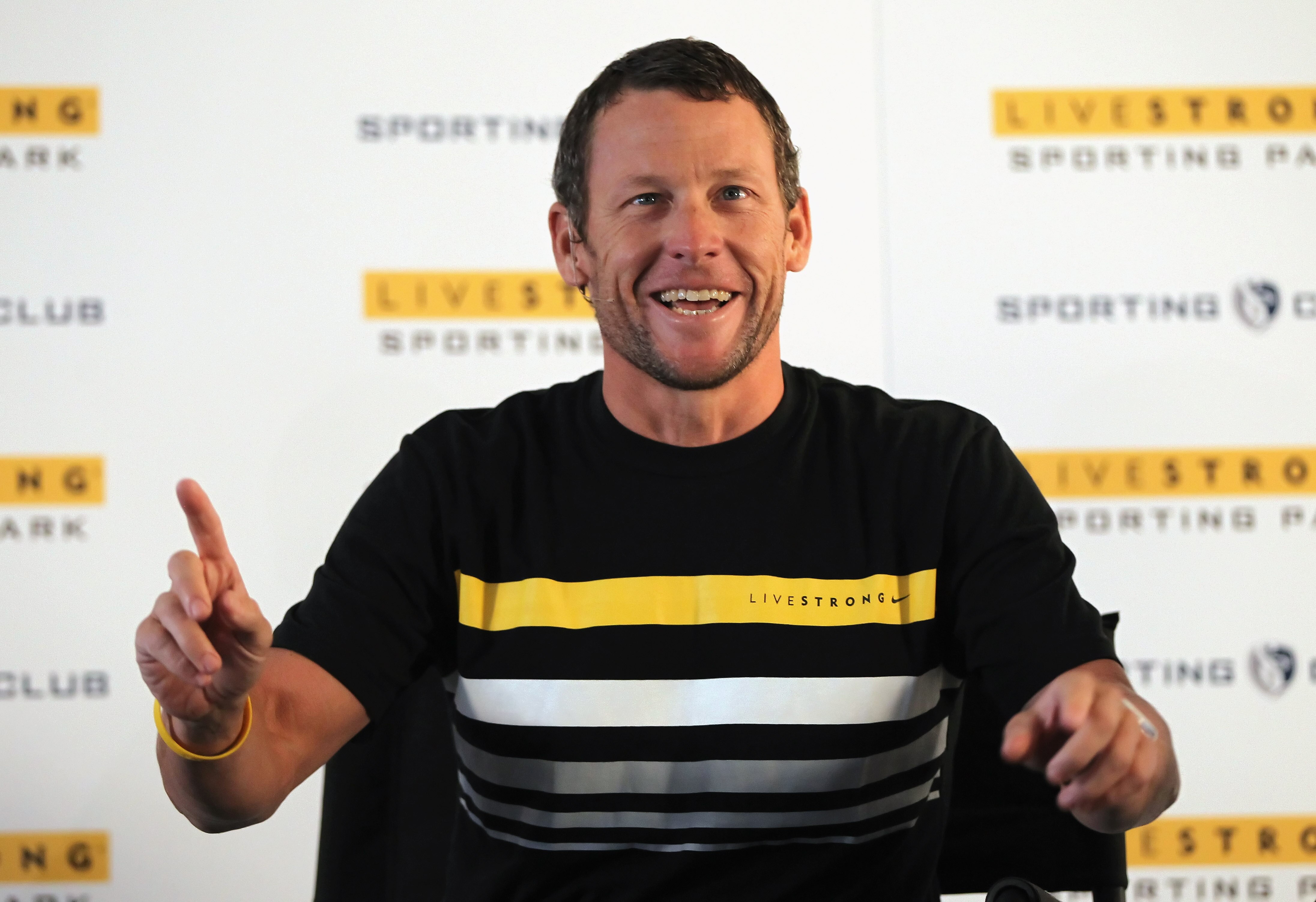 KANSAS CITY, KS - MARCH 08:  Champion cyclist, cancer survivor, and Livestrong founder Lance Armstrong addresses the media during a press conference to announce the naming rights of a new stadium to be called Livestrong Sporting Park to host Sporting Kans