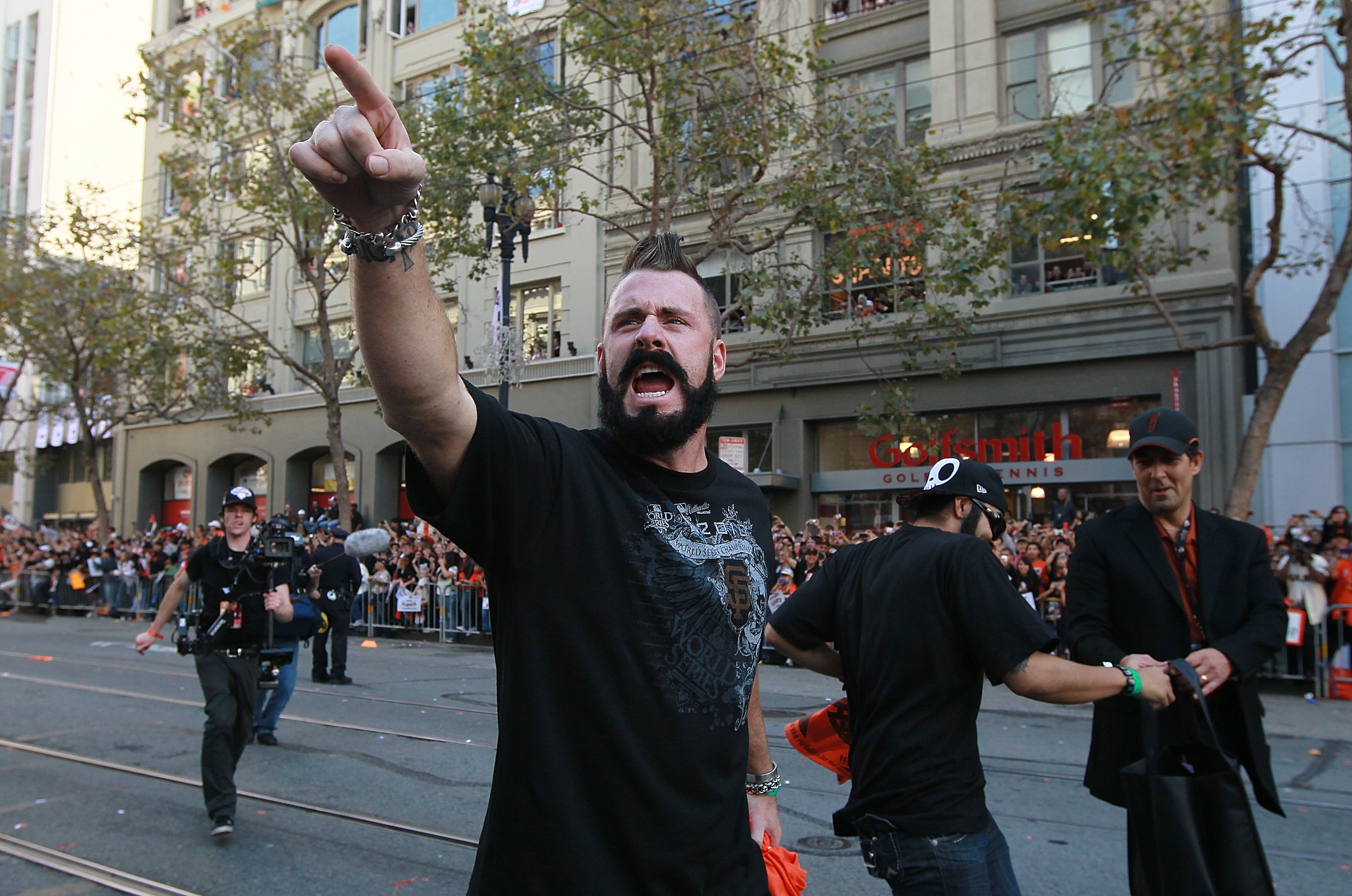 SAN FRANCISCO - NOVEMBER 03:  Brian Wilson of the San Francisco Giants celebrates during the Giants' vicotry parade on November 3, 2010 in San Francisco, California. Thousands of Giants fans lined the streets of San Francisco to watch the San Francisco Gi