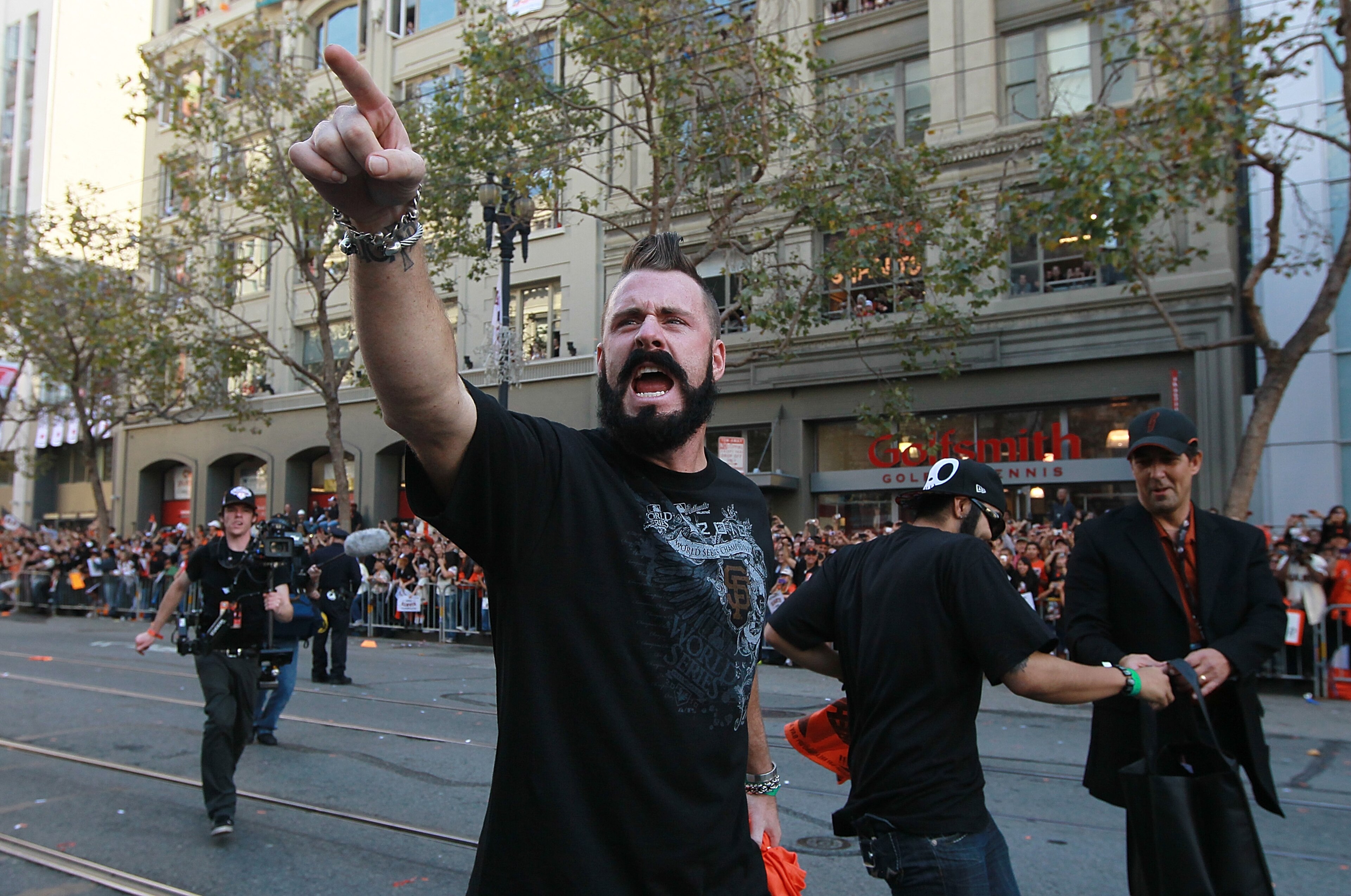 SAN FRANCISCO - NOVEMBER 03:  Brian Wilson of the San Francisco Giants celebrates during the Giants' vicotry parade on November 3, 2010 in San Francisco, California. Thousands of Giants fans lined the streets of San Francisco to watch the San Francisco Gi