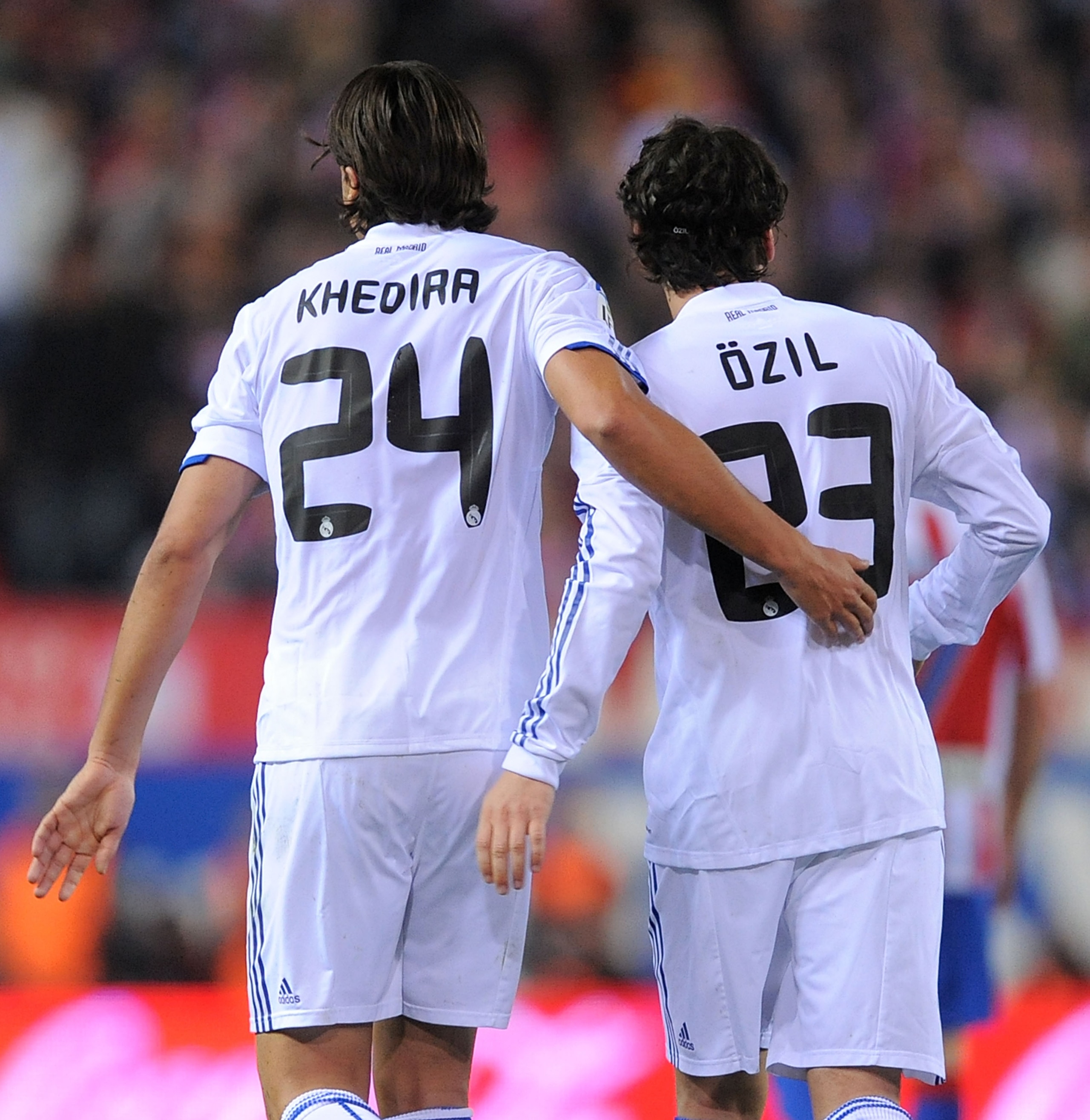 MADRID, SPAIN - MARCH 19:  Sami Khedira of Real Madrid celebrates with Mesut Ozil after Ozil scored Real's second goal during the La Liga match between Atletico Madrid and Real Madrid at Vicente Calderon Stadium on March 19, 2011 in Madrid, Spain.  (Photo