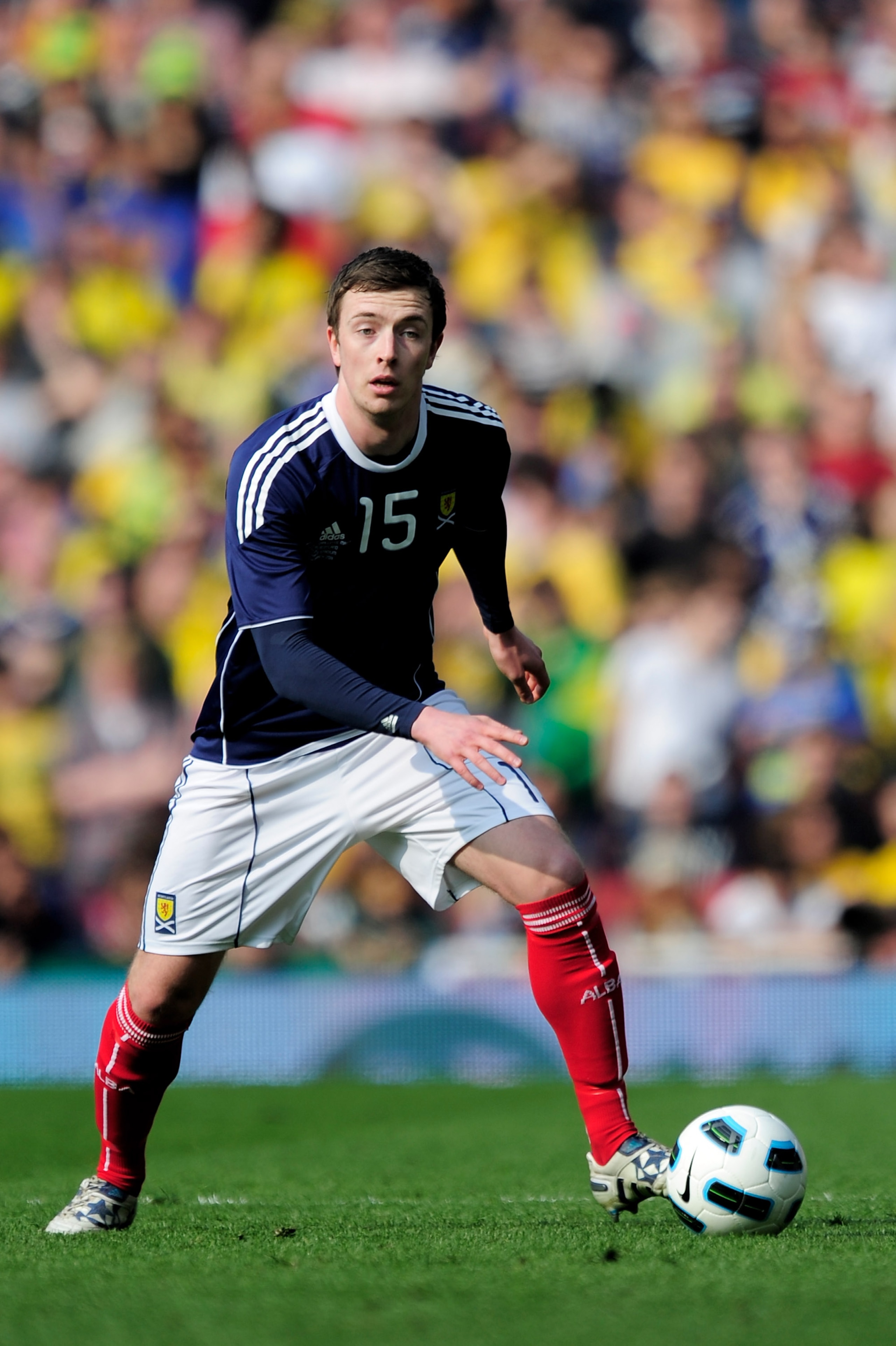 LONDON, ENGLAND - MARCH 27:  Danny Wilson of Scotland on the ball during the International friendly match between Brazil and Scotland at Emirates Stadium on March 27, 2011 in London, England.  (Photo by Jamie McDonald/Getty Images)