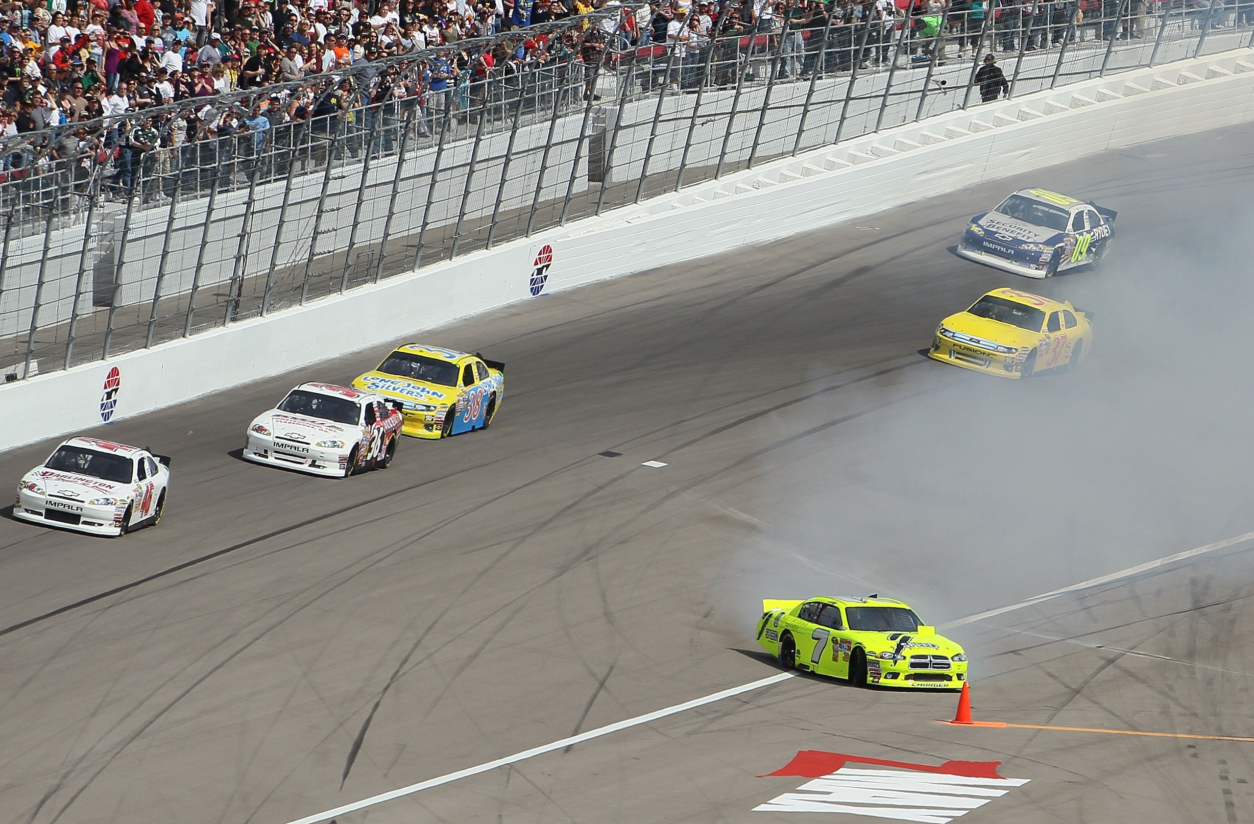 LAS VEGAS, NV - MARCH 06:  Robby Gordon driver of the #7 Speed Energy Dodge spins out on the front stretch during the NASCAR Sprint Cup Series Kobalt Tools 400 at Las Vegas Motor Speedway on March 6, 2011 in Las Vegas, Nevada.  (Photo by Jeff Gross/Getty