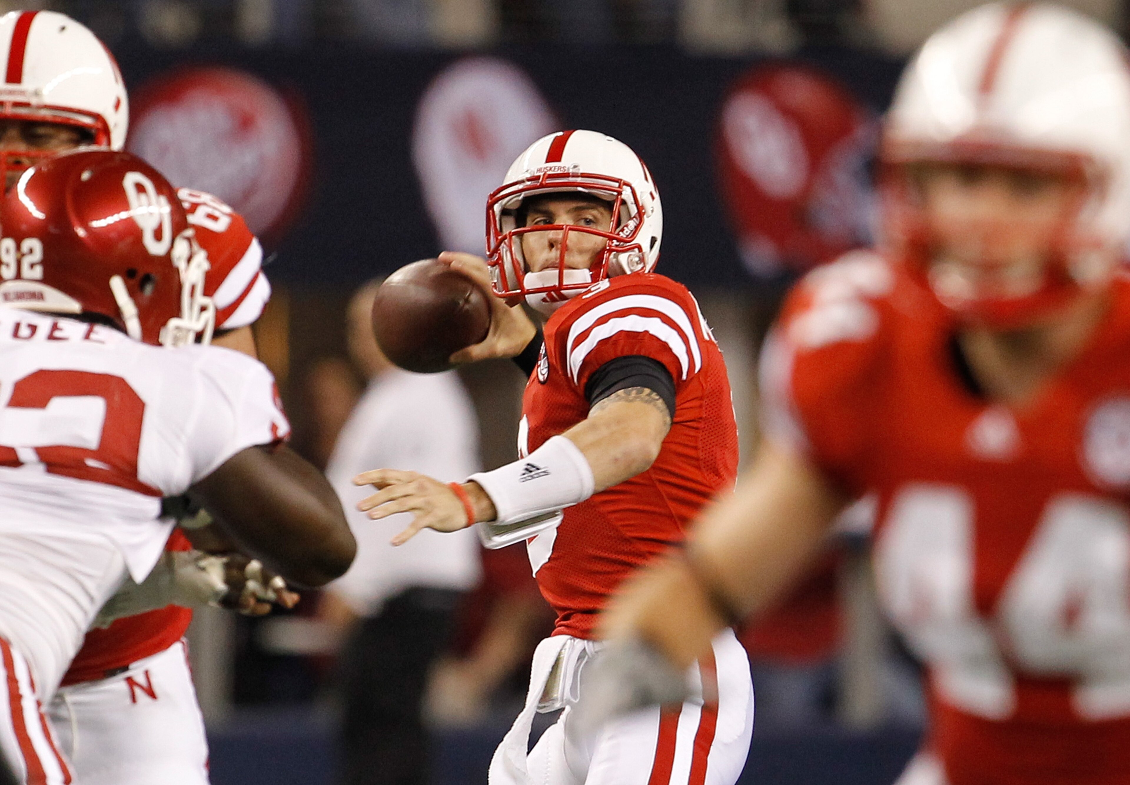 ARLINGTON, TX - DECEMBER 04:  Quarterback Taylor Martinez #3 of the Nebraska Cornhuskers looks for an open receiver against the Oklahoma Sooners at Cowboys Stadium on December 4, 2010 in Arlington, Texas.  (Photo by Tom Pennington/Getty Images)