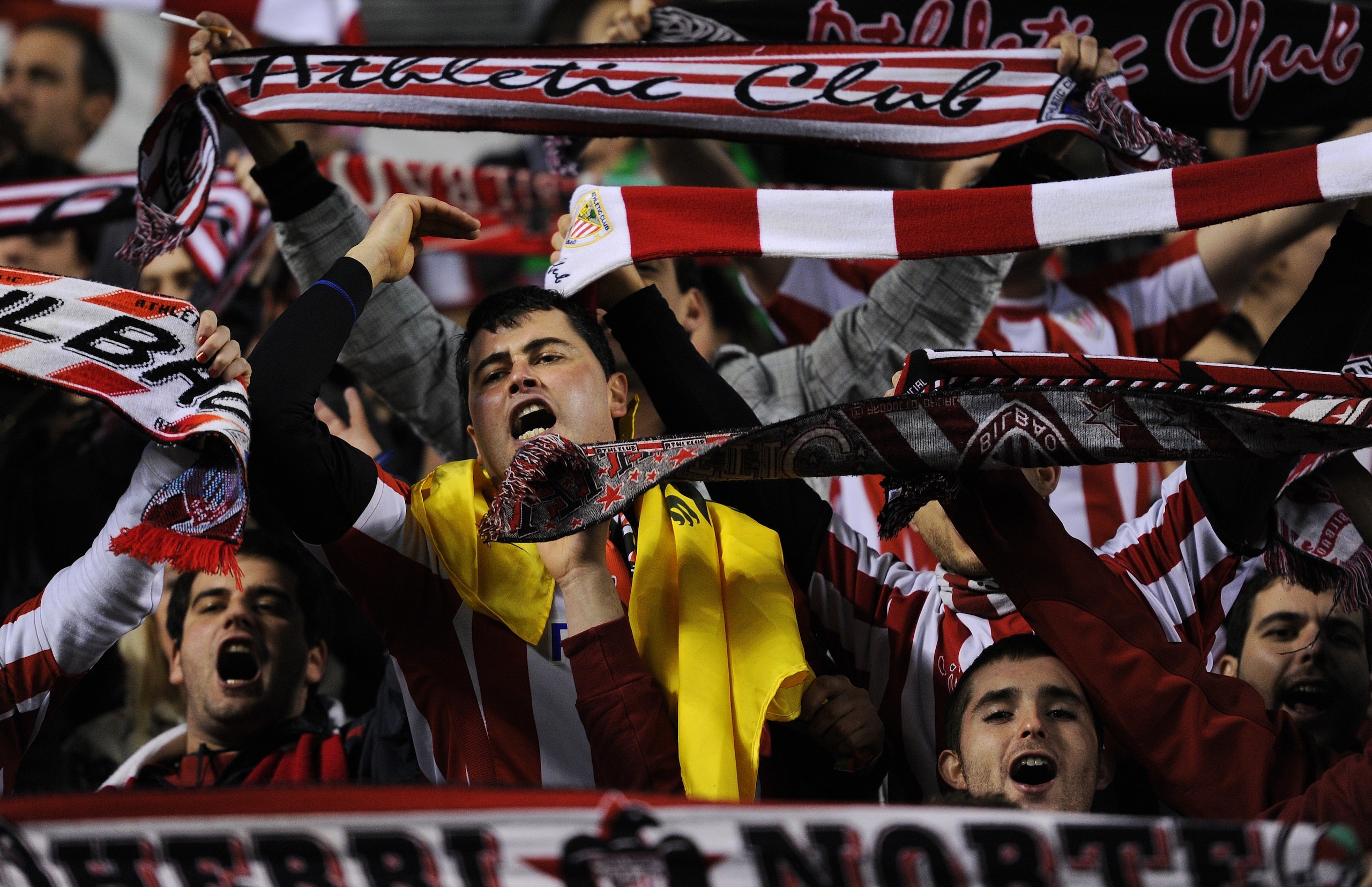 BILBAO, SPAIN - JANUARY 05:  Athletic Bilbao supporters cheer for their team during the round of last 16 Copa del Rey second leg match between Athletic Bilbao and FC Barcelona at Estadio de San Mames on January 5, 2011 in Bilbao, Spain. The match ended in
