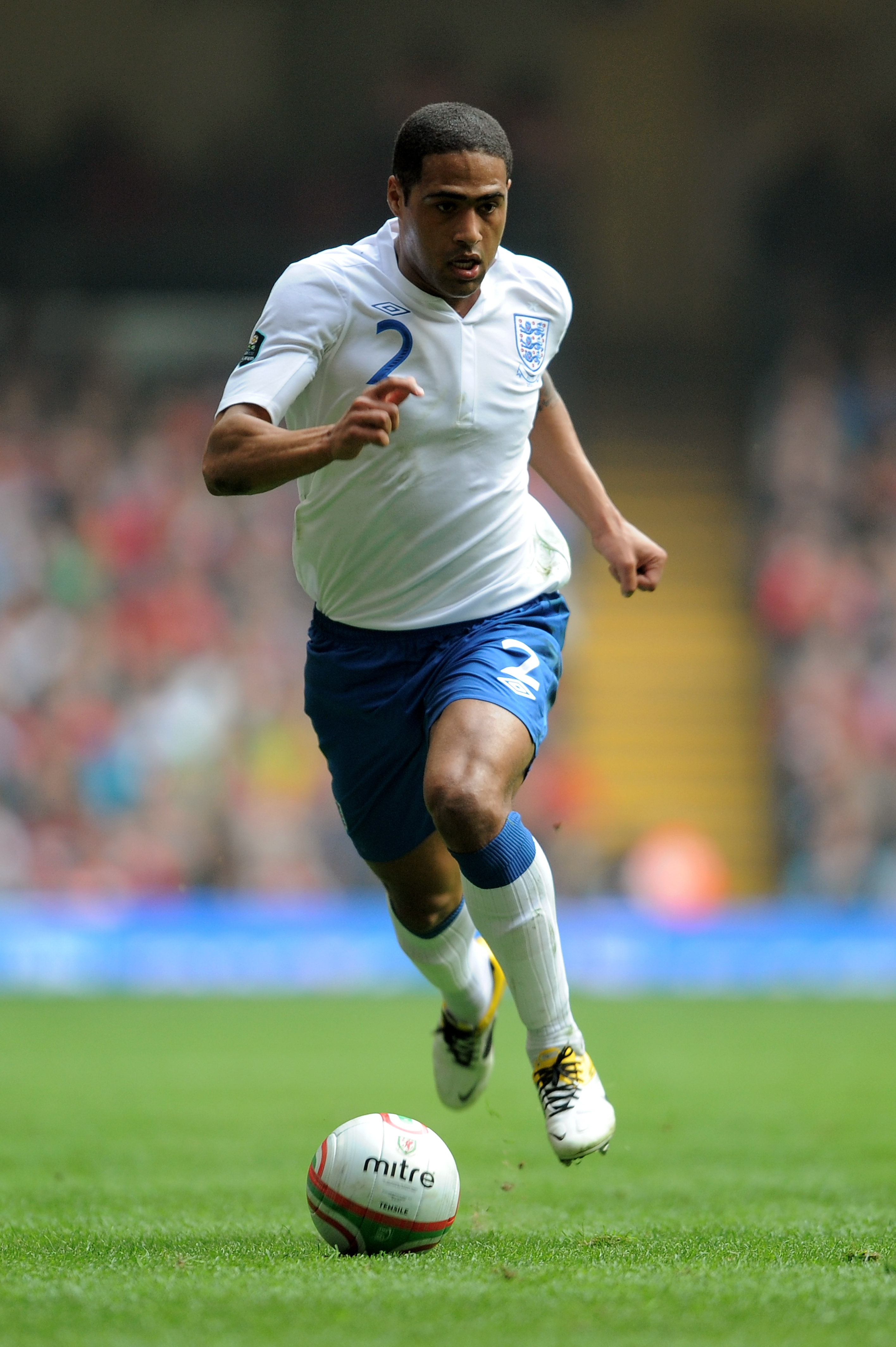 CARDIFF, WALES - MARCH 26:  Glen Johnson of England runs with the ball during the UEFA EURO 2012 Group G qualifying match between Wales and England at the Millennium Stadium on March 26, 2011 in Cardiff, Wales.  (Photo by Michael Regan/Getty Images)