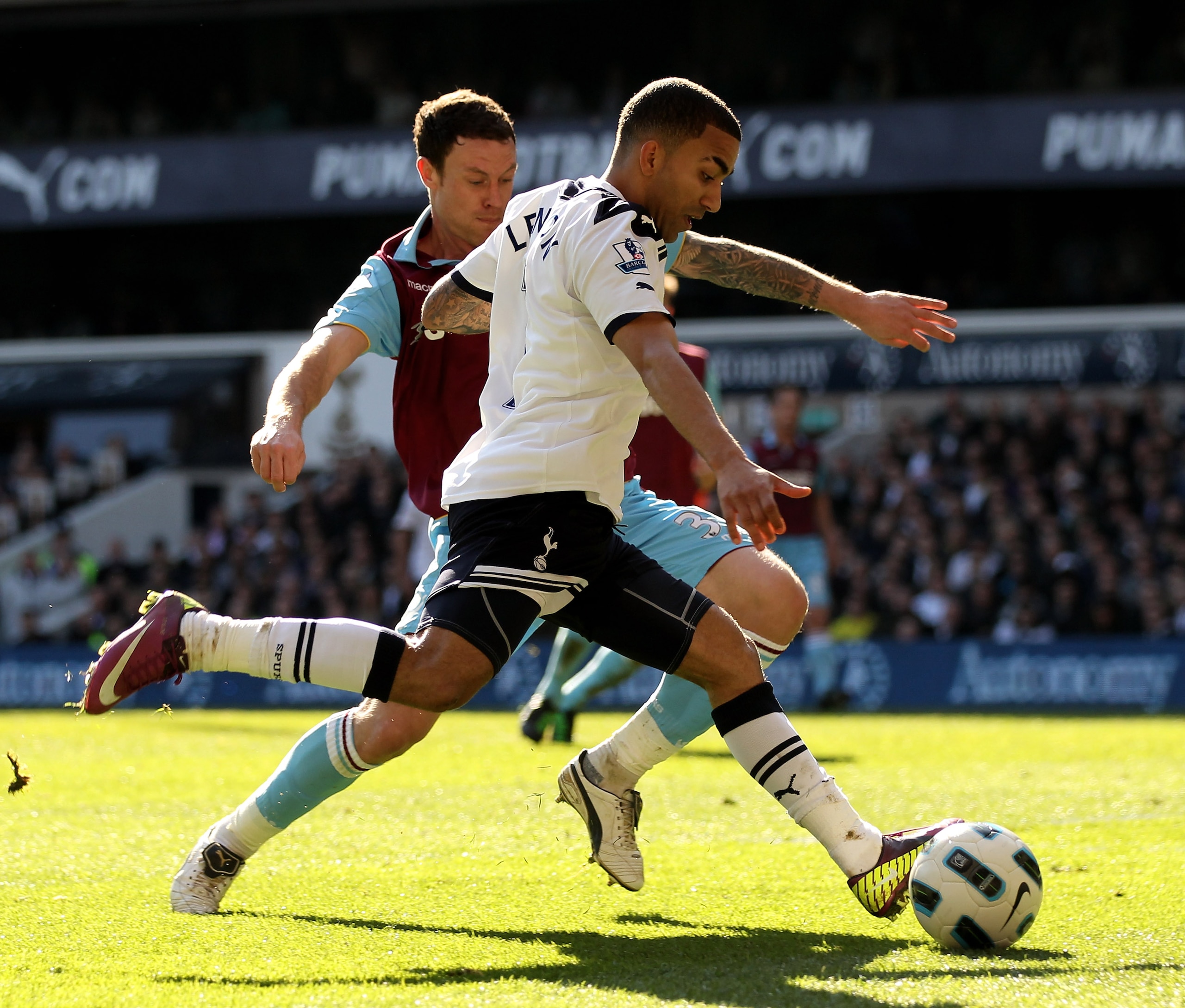 LONDON, ENGLAND - MARCH 19:  Aaron Lennon (R) of Tottenham in action against Wayne Bridge of West Ham during the Barclays Premier League match between Tottenham Hotspur and West Ham United at White Hart Lane on March 19, 2011 in London, England.  (Photo b