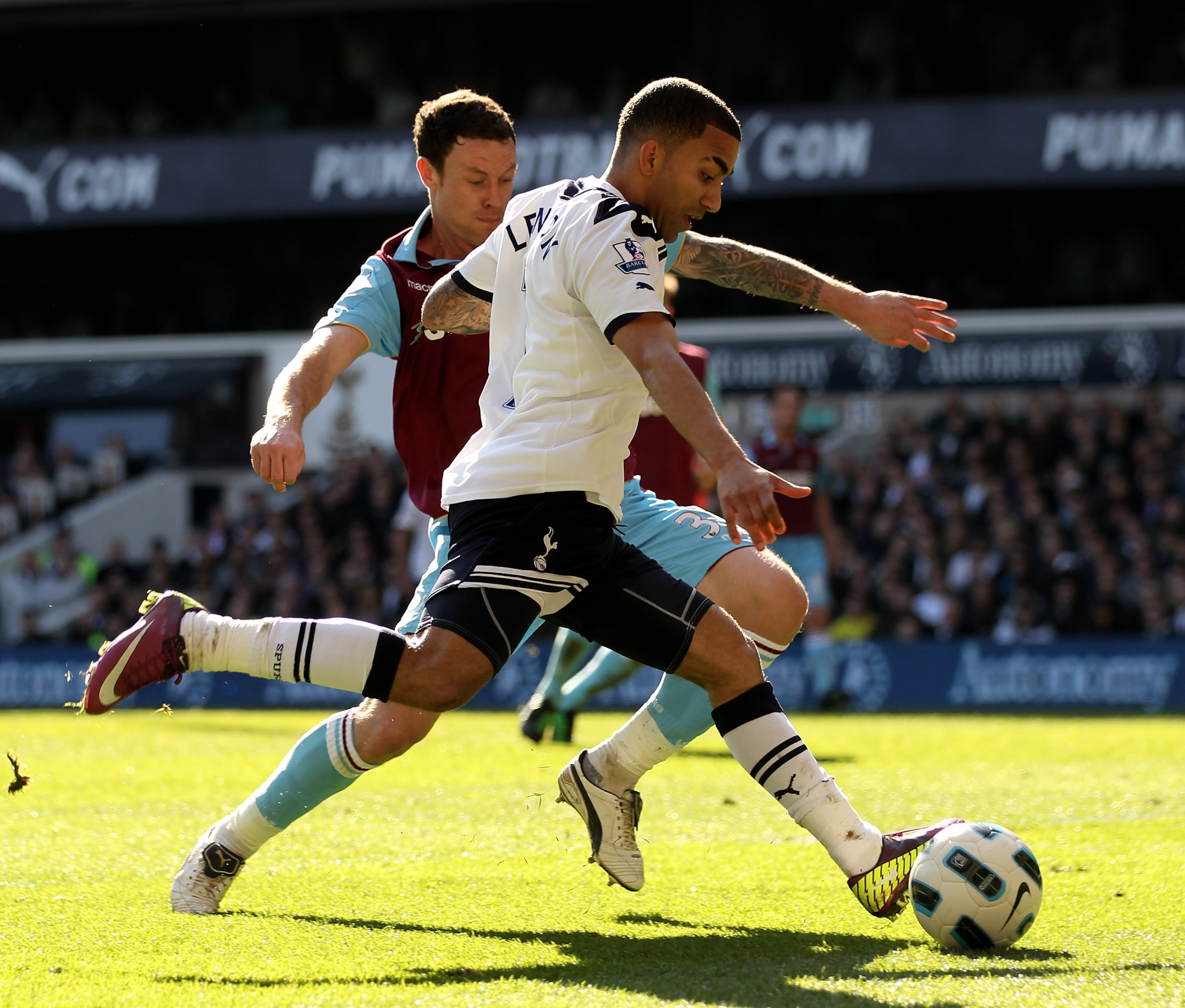 LONDON, ENGLAND - MARCH 19:  Aaron Lennon (R) of Tottenham in action against Wayne Bridge of West Ham during the Barclays Premier League match between Tottenham Hotspur and West Ham United at White Hart Lane on March 19, 2011 in London, England.  (Photo b