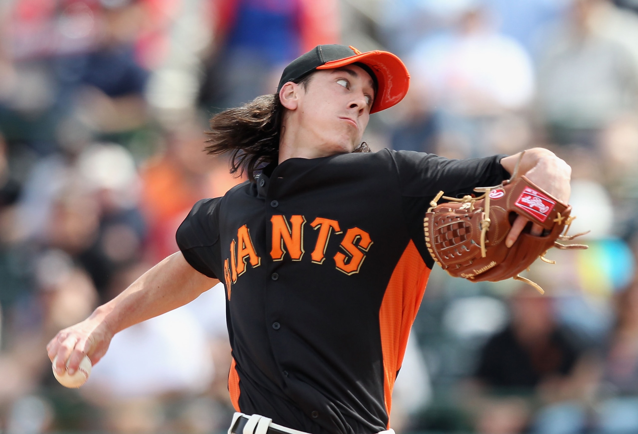 SCOTTSDALE, AZ - MARCH 01:  Starting pitcher Tim Lincecum #55 of the San Francisco Giants pitches against the Chicago Cubs during the spring training game at Scottsdale Stadium on March 1, 2011 in Scottsdale, Arizona.  (Photo by Christian Petersen/Getty I