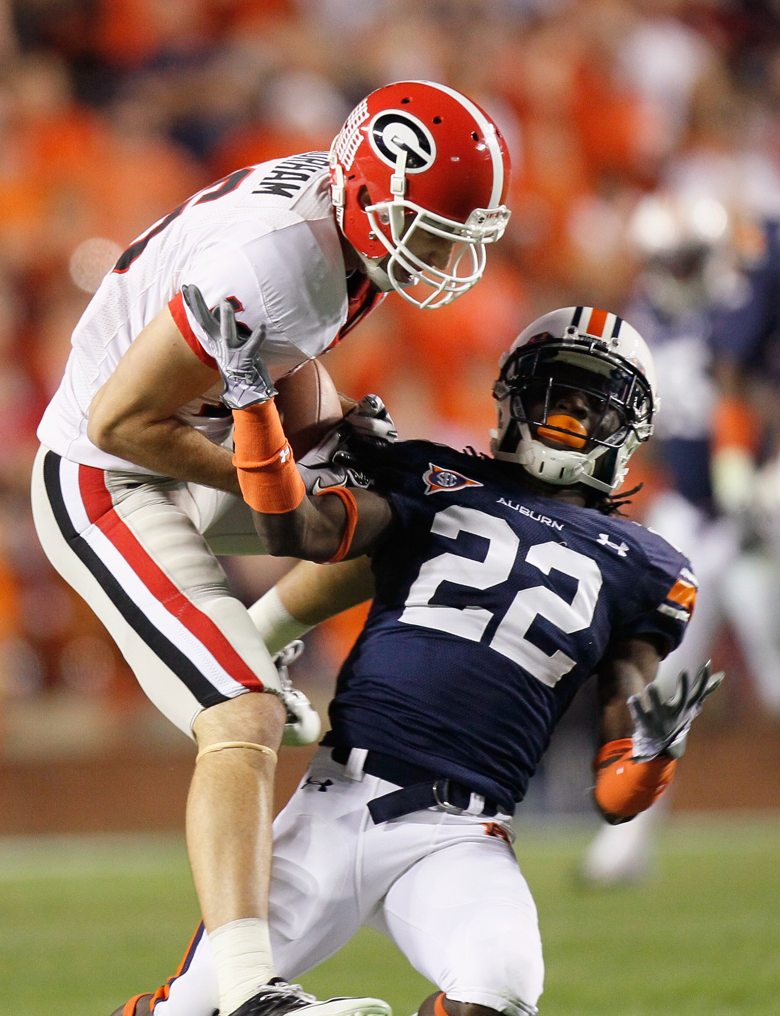 AUBURN, AL - NOVEMBER 13: Kris Durham #16 of the Georgia Bulldogs pulls in this reception against T'Sharvan Bell #22 of the Auburn Tigers at Jordan-Hare Stadium on November 13, 2010 in Auburn, Alabama. (Photo by Kevin C. Cox/Getty Images) AUBURN, AL - NOVEMBER 13: Kris Durham #16 of the Georgia Bulldogs pulls in this reception against T'Sharvan Bell #22 of the Auburn Tigers at Jordan-Hare Stadium on November 13, 2010 in Auburn, Alabama. (Photo by Kevin C. Cox/Getty Images)