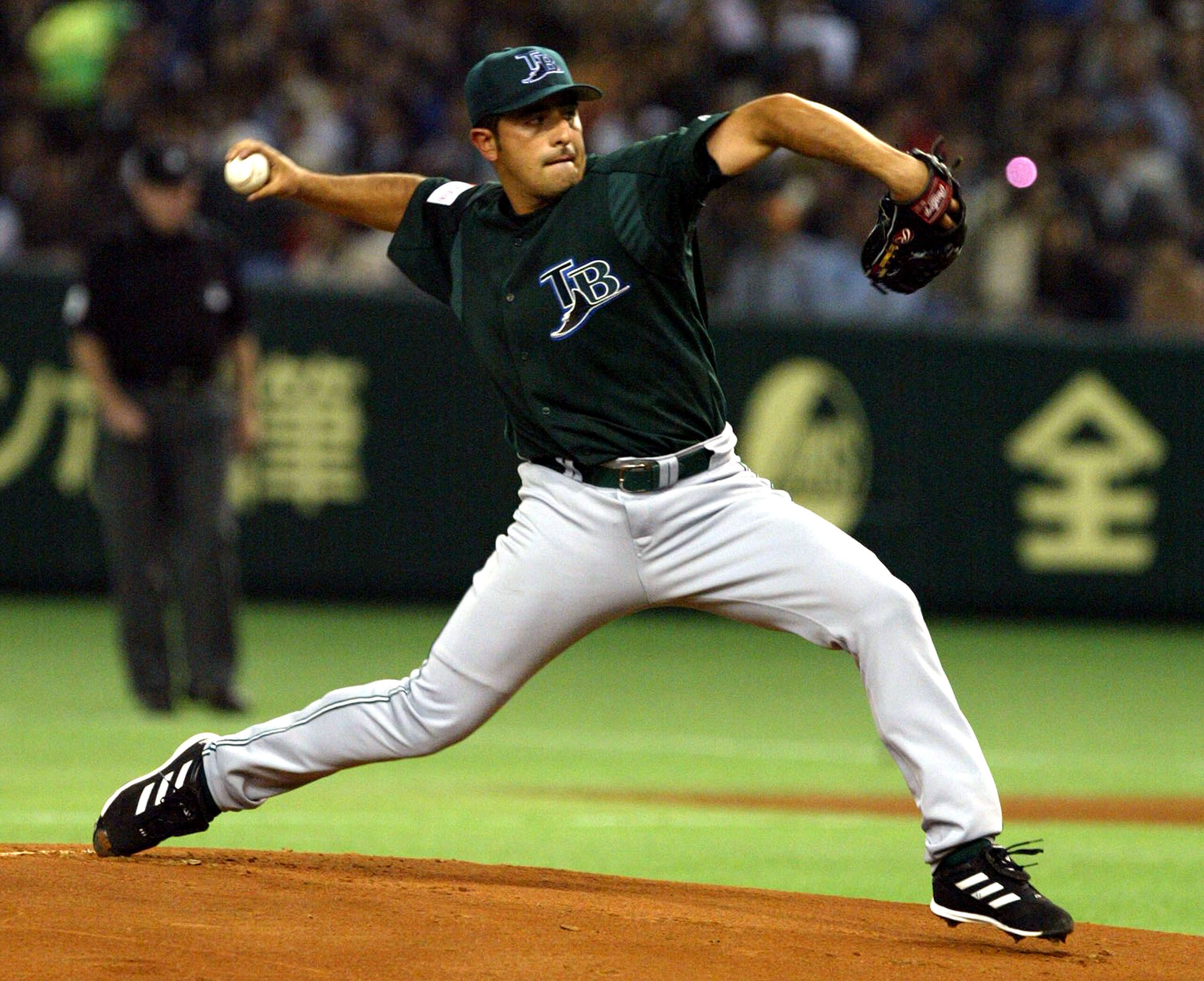 TOKYO, JAPAN - MARCH 30:  Victor Zambrano #47 of Tampa Bay Devil Rays throws the first pitch to start the season-opening game of Major League Baseball against the New York Yankees at the Tokyoi Dome March 30, 2004 in Tokyo, Japan.  (Photo by Junko Kimura/